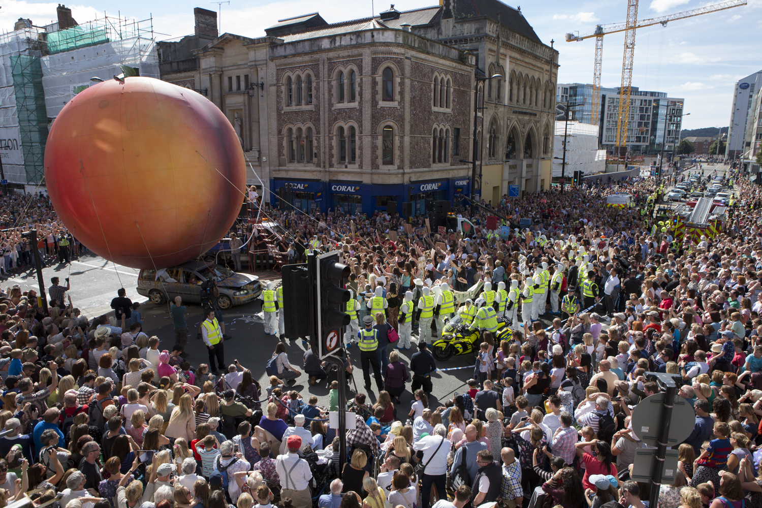 A Giant Peach appeared in Cardiff City Centre as part of ROALD DAHL'S CITY OF THE UNEXPECTED presented by Wales Millennium Centre and National Theatre Wales. Photography by Dan Green.jpg