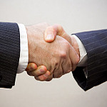 Handshake - 2 men Photo by Flazingo Photos under CC BY-SA 2.0