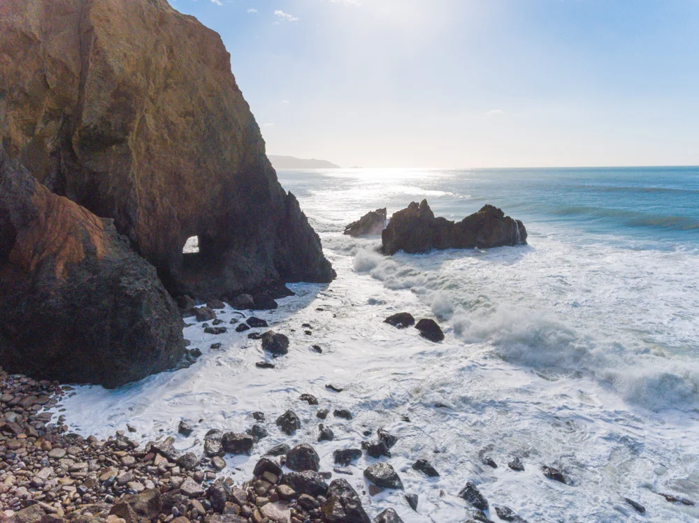 Tobin Tunnel (hole in rock) and Surf. Mussel Rock. 2016. DJI Phantom 4 Drone.