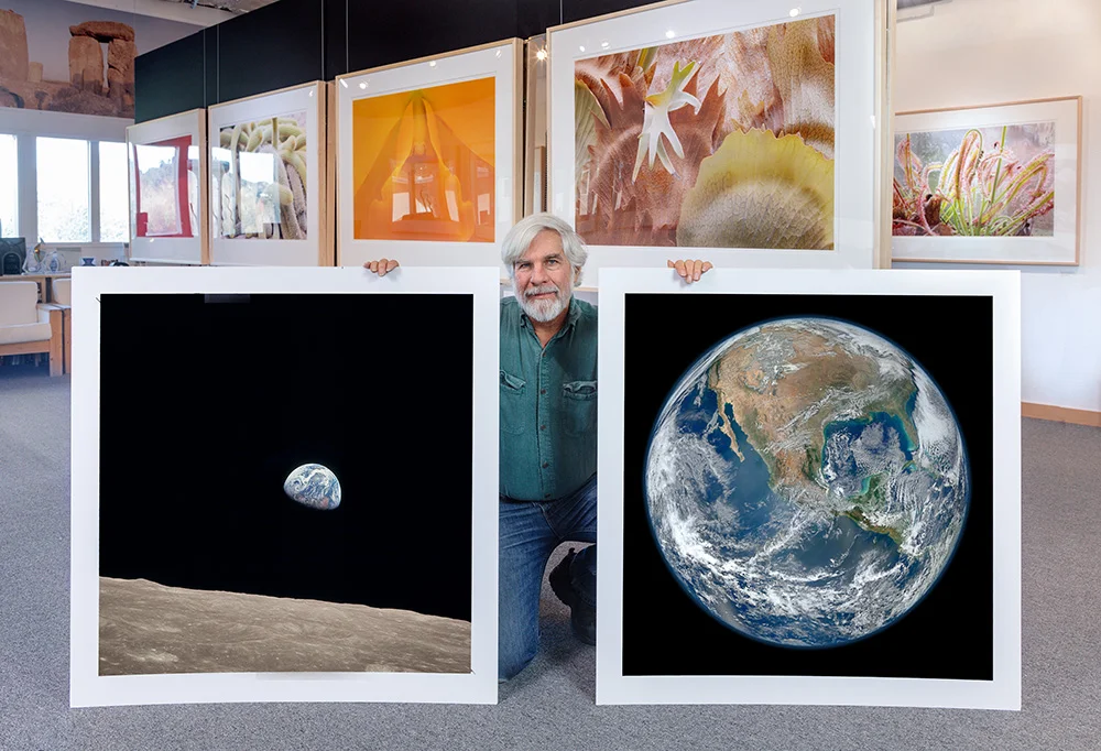Steve with Two Prints from the Space Photography Exhibit. 2018