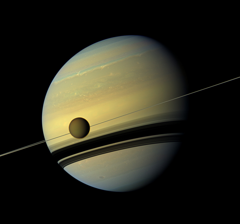 Saturn on Edge with Rings and Titan