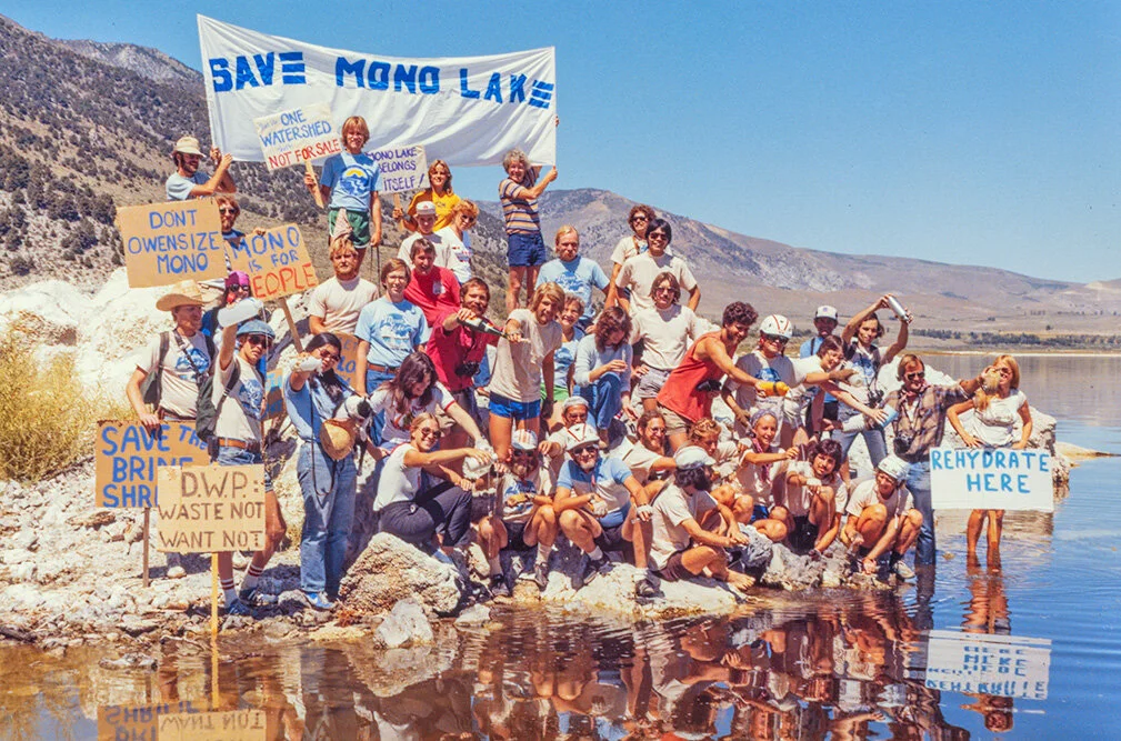Mono Lake Bucket Brigade. Carrying water around the Los Angeles Dept. of Water and Power diversion point. Walking down Highway 120, then up Highway 395 to pour the Lee Vining Creek water into the lake where it belonged. c 1981. Mamiya RB67 Kodak Ver…
