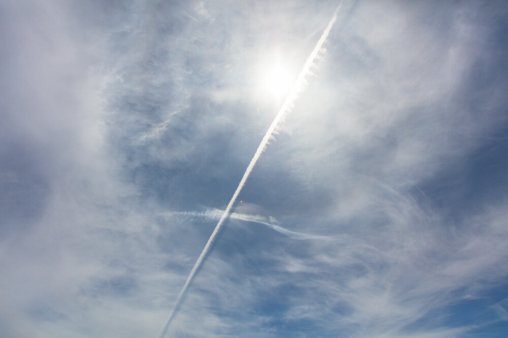 Shadowed Contrail with Sun. Pacifica, CA. 2019. Canon EOS 5DSr.