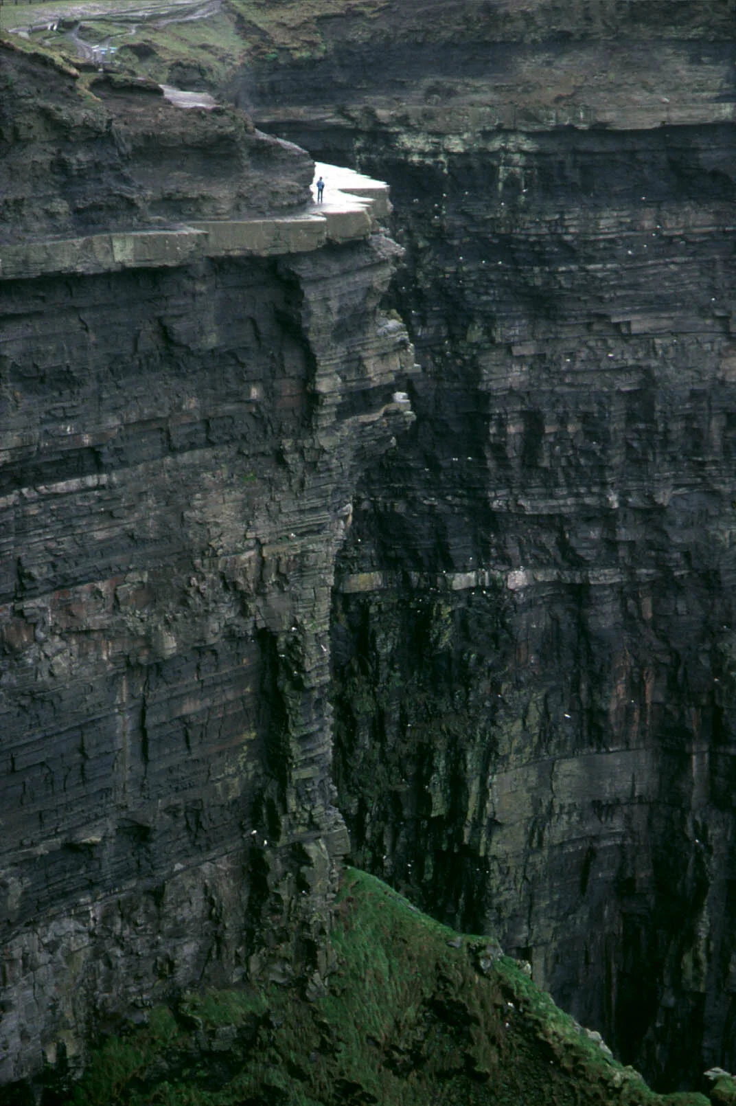 Steve Johnson on the Cliffs of Mohrer. Ireland. Anthony Hobbs. 2000..