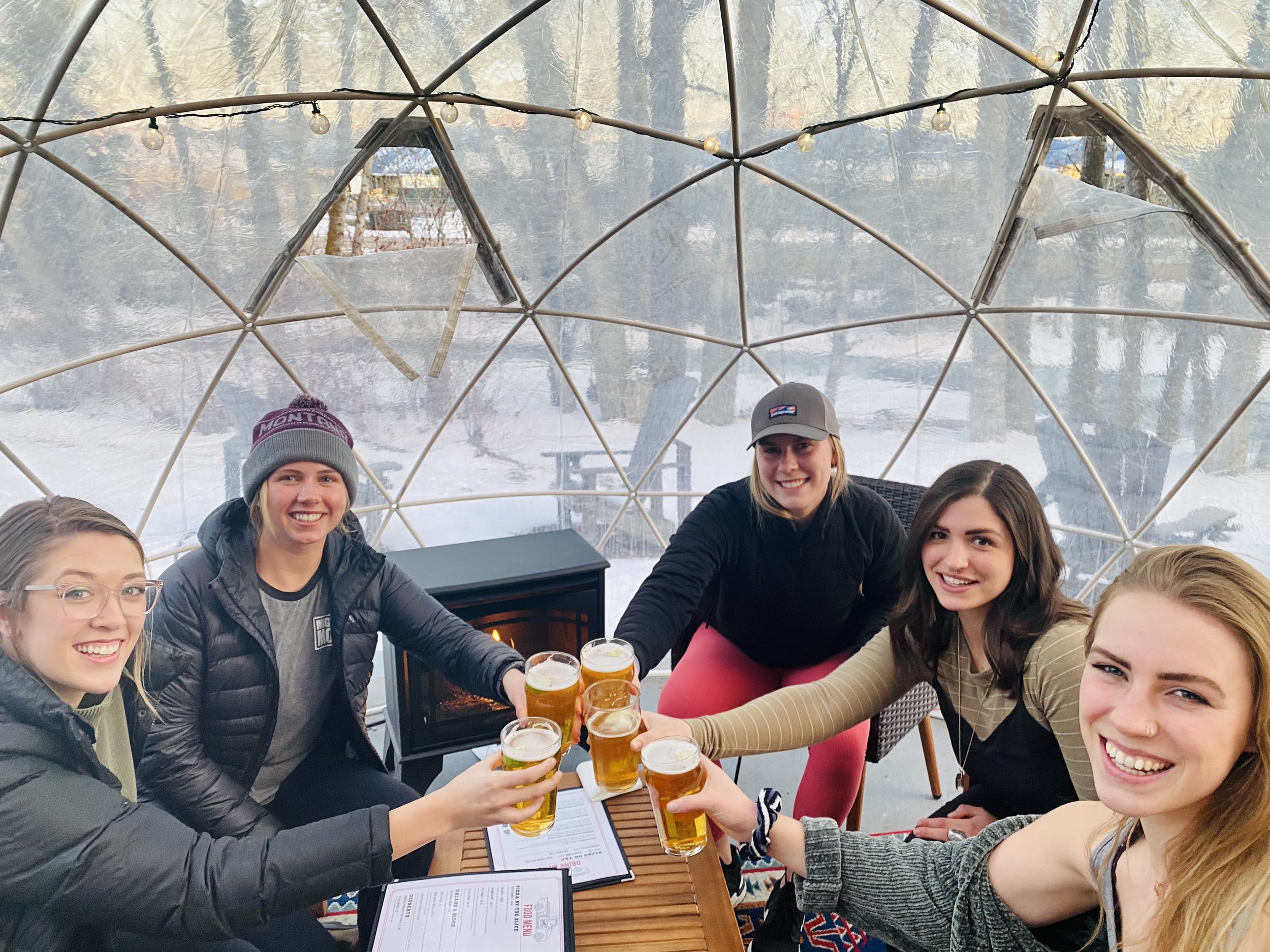 girls in the igloo staff cheers.JPG