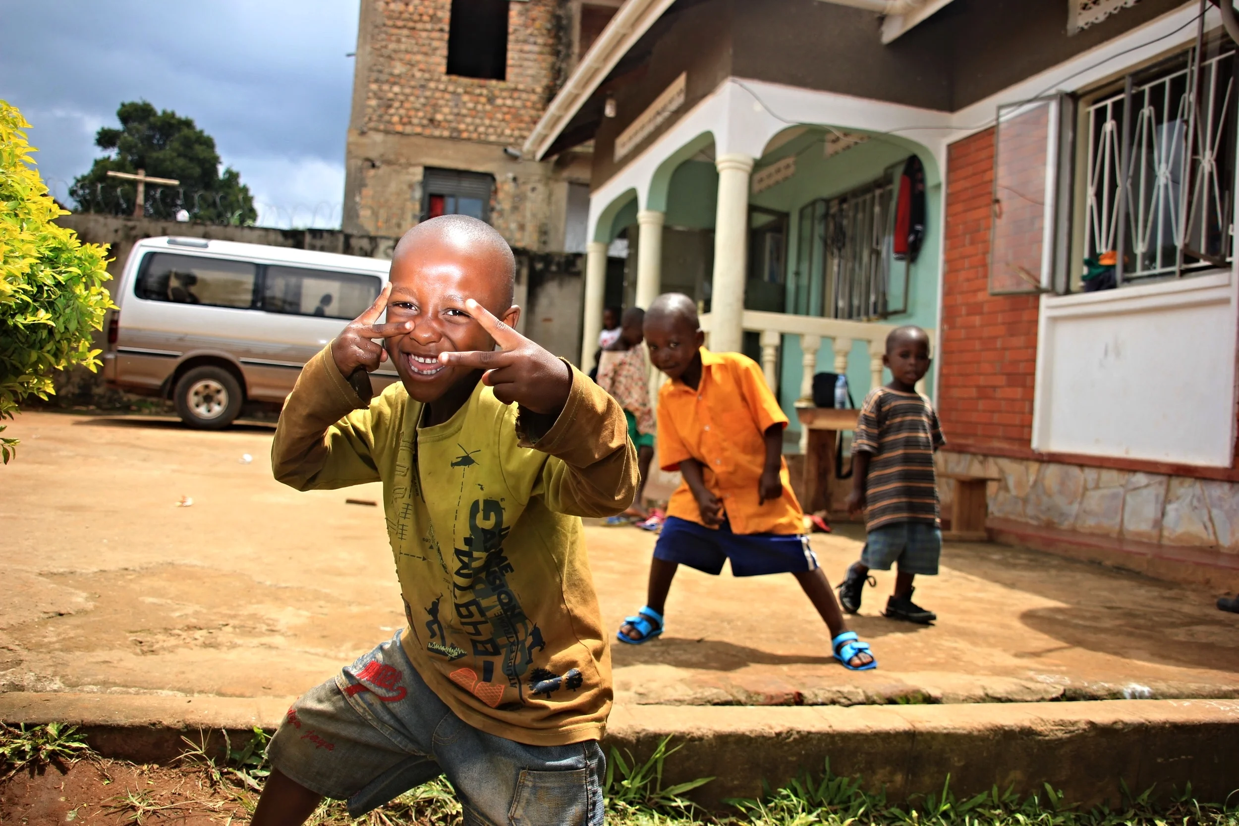 Our traveling companion Russell left the nigh before us. As we were contemplating the week's accomplishments he invited us to choose a picture that would illustrate our time. Though it's hard to choose this one is one of my top choices. These Kids have nothing, and yet are full of life, take away the context these kids could be child celebrity actors or musicians. the last thing I wanted was to bring back pictures of sad kids to milk western pity