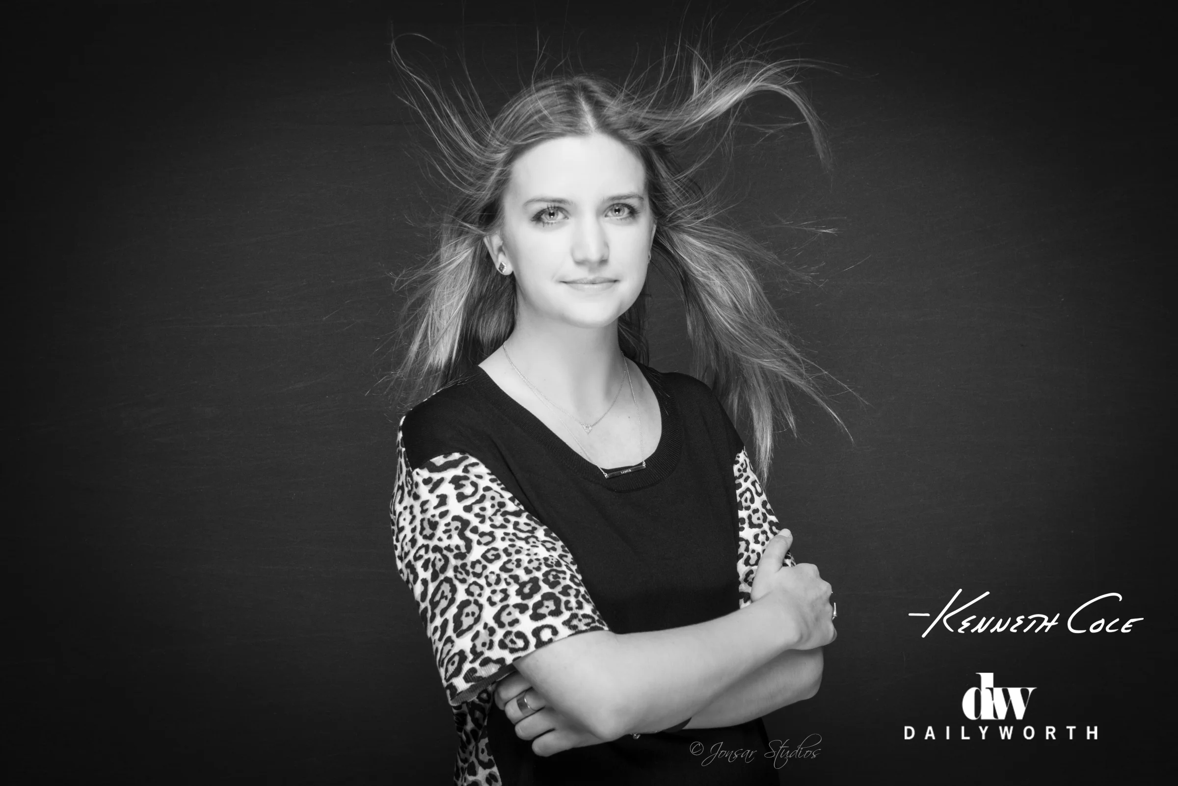 Black and White Portrait of Blonde Woman with Blowing hair sponsored by Kenneth Cole