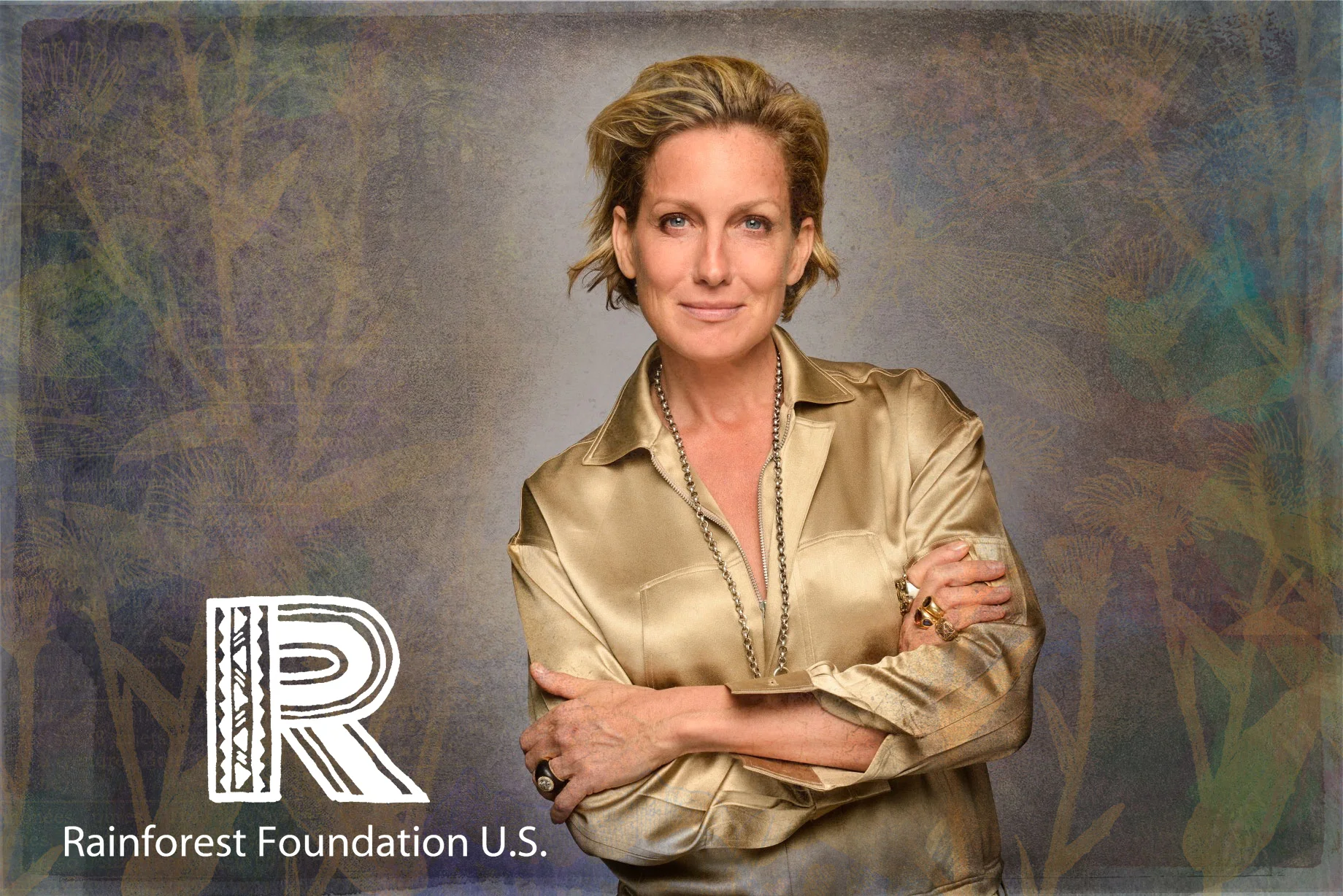 Portrait of Woman wearing gold shiny shirt on Colorful custom background for Rainforest Foundation event