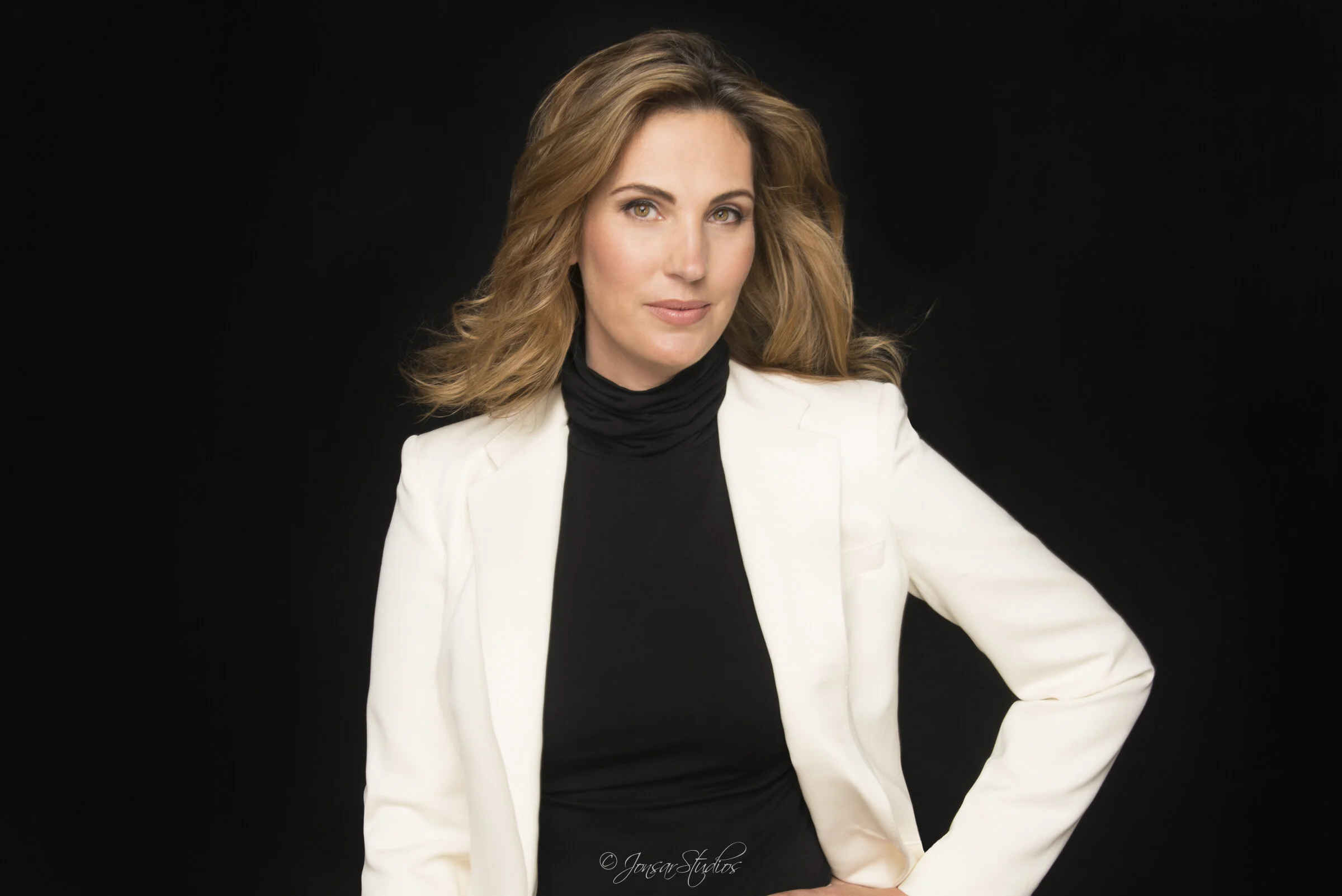 Corporate Headshot of Executive Woman on Black Background