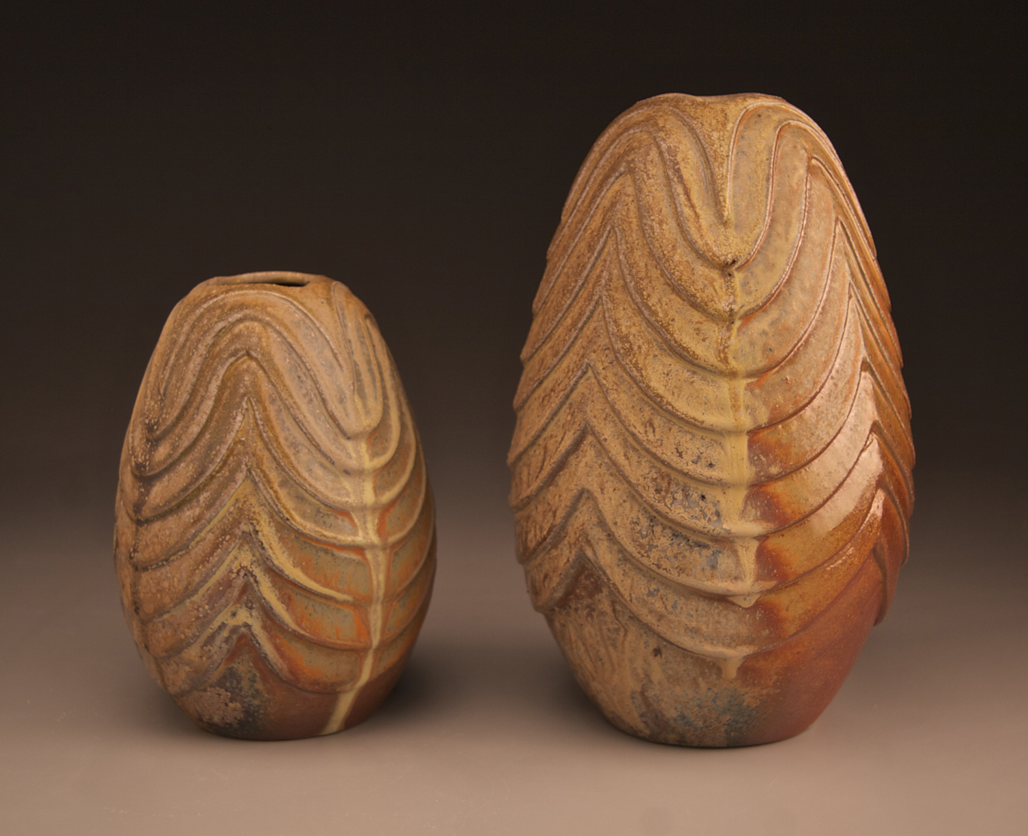 Carved Vases with Iron and Ash Glazes 12" & 16" tall