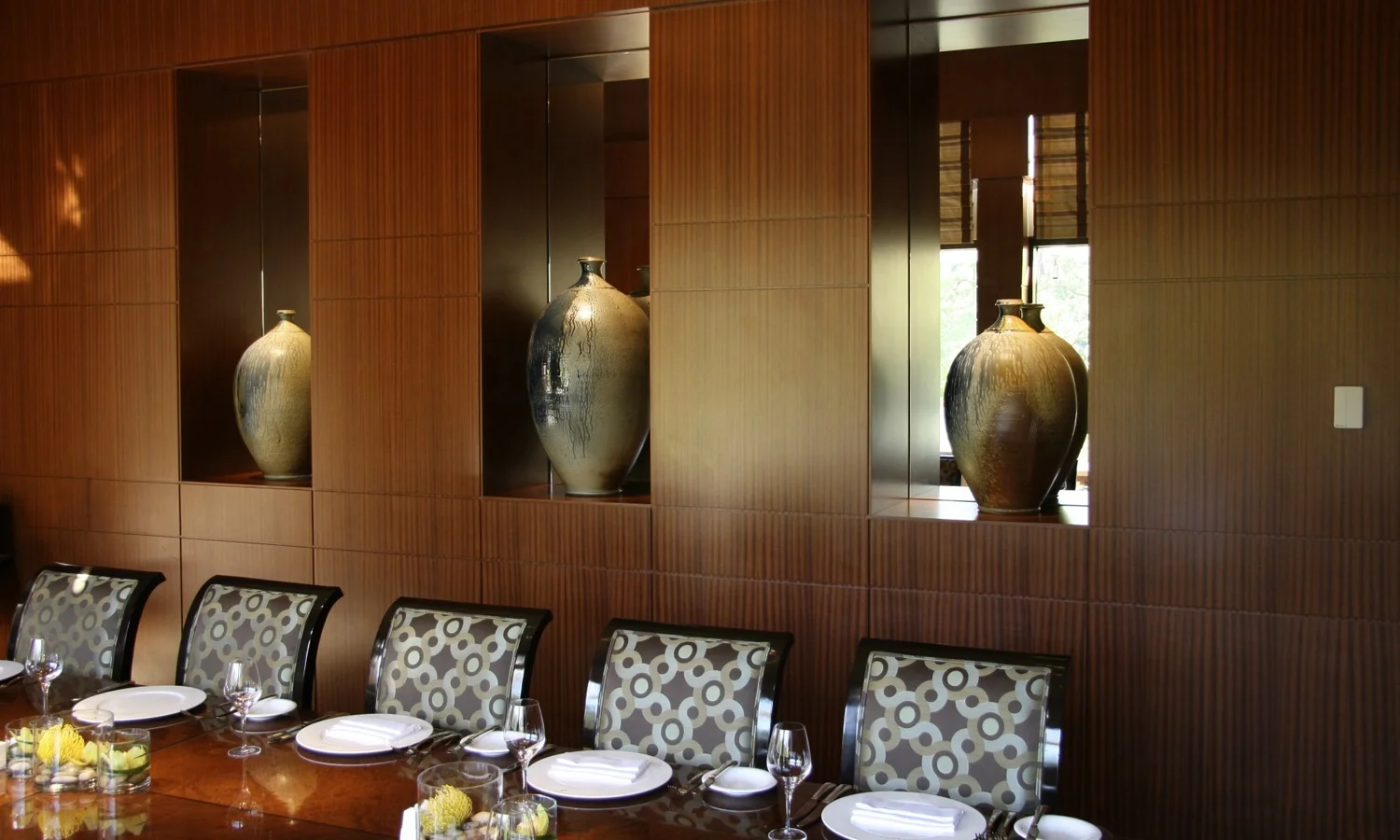 Large ceramic bottles by Ben Owen III in Herons Restaurant, Cary, NC.