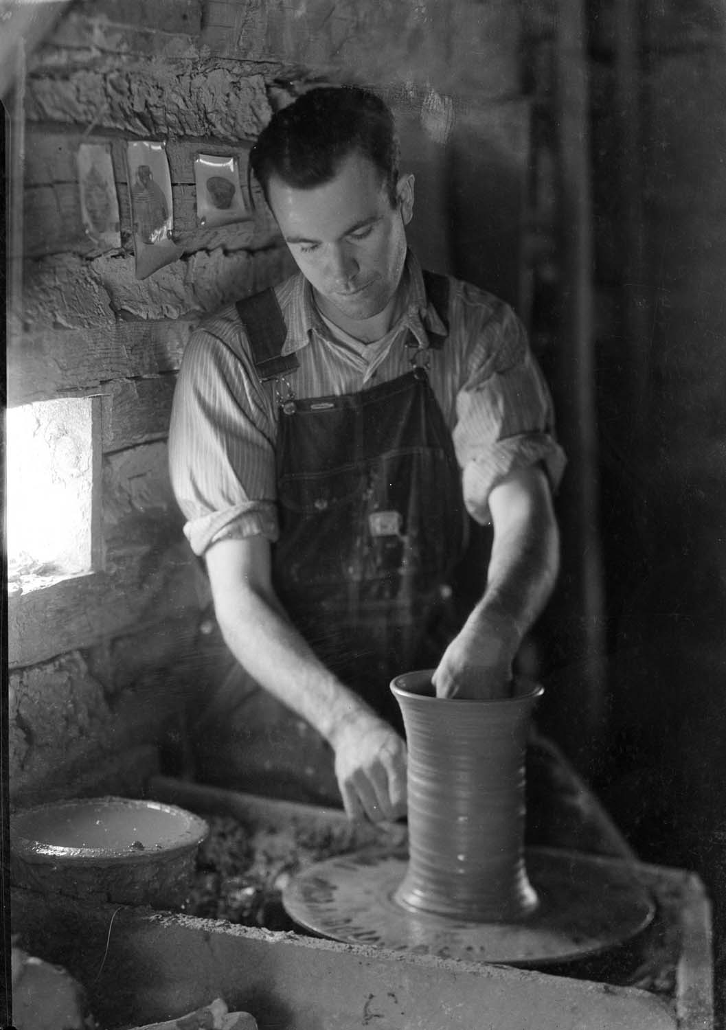 Ben Owen Sr. Throwing Pots at Jugtown 1920s.jpg