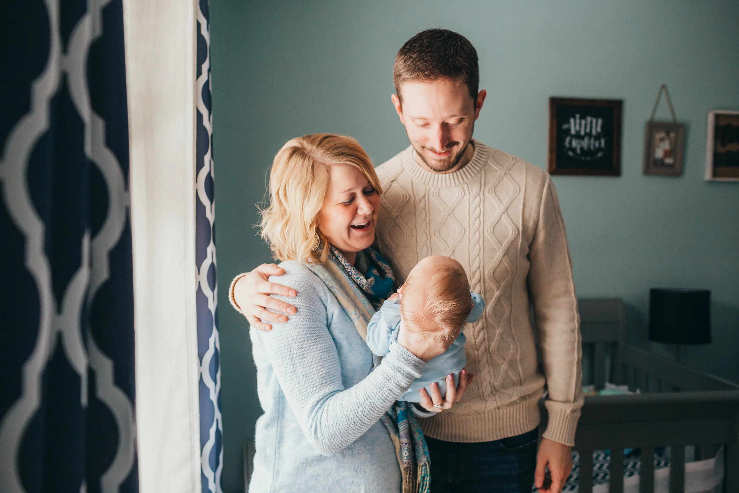 parents-pose-with-newborn-baby-photo-idea-.JPG