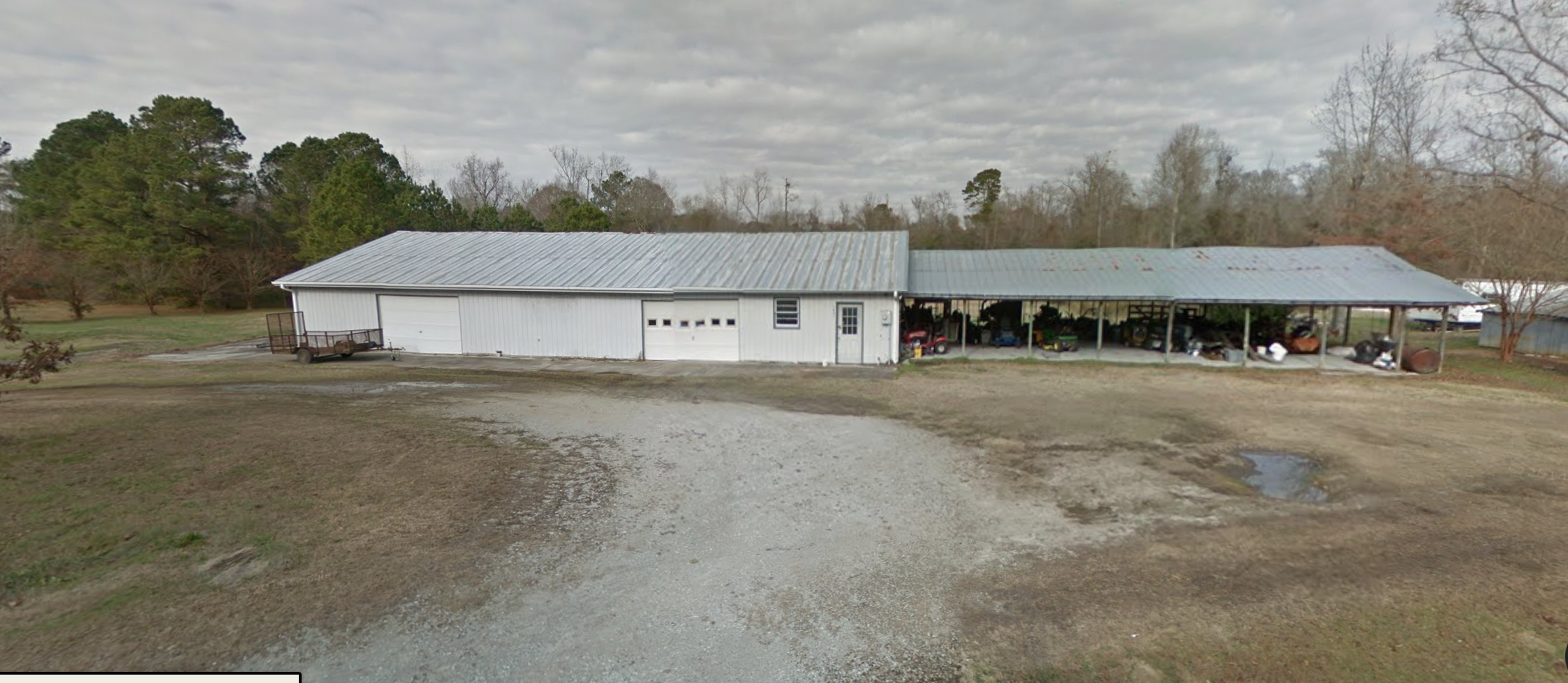 The warehouse and site of first greenhouse (on the right).