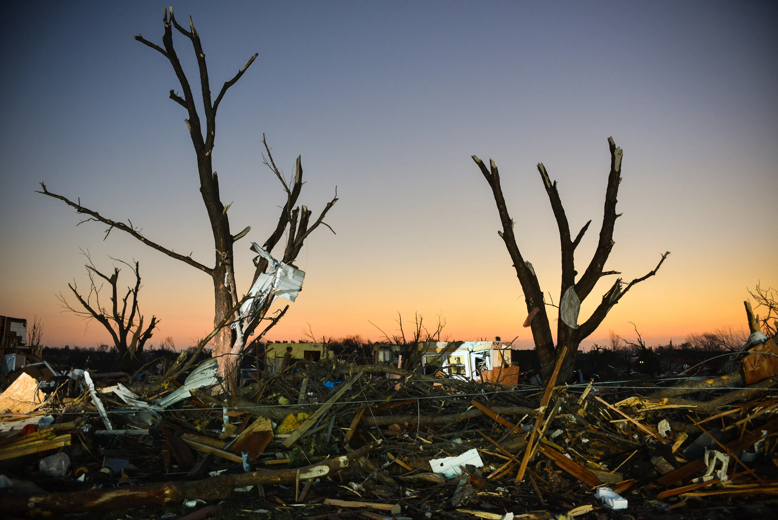  The dawn breaks over Washington, IL November 18, 2013, where the day before a tornado ripped through the town leveling homes and businesses. 