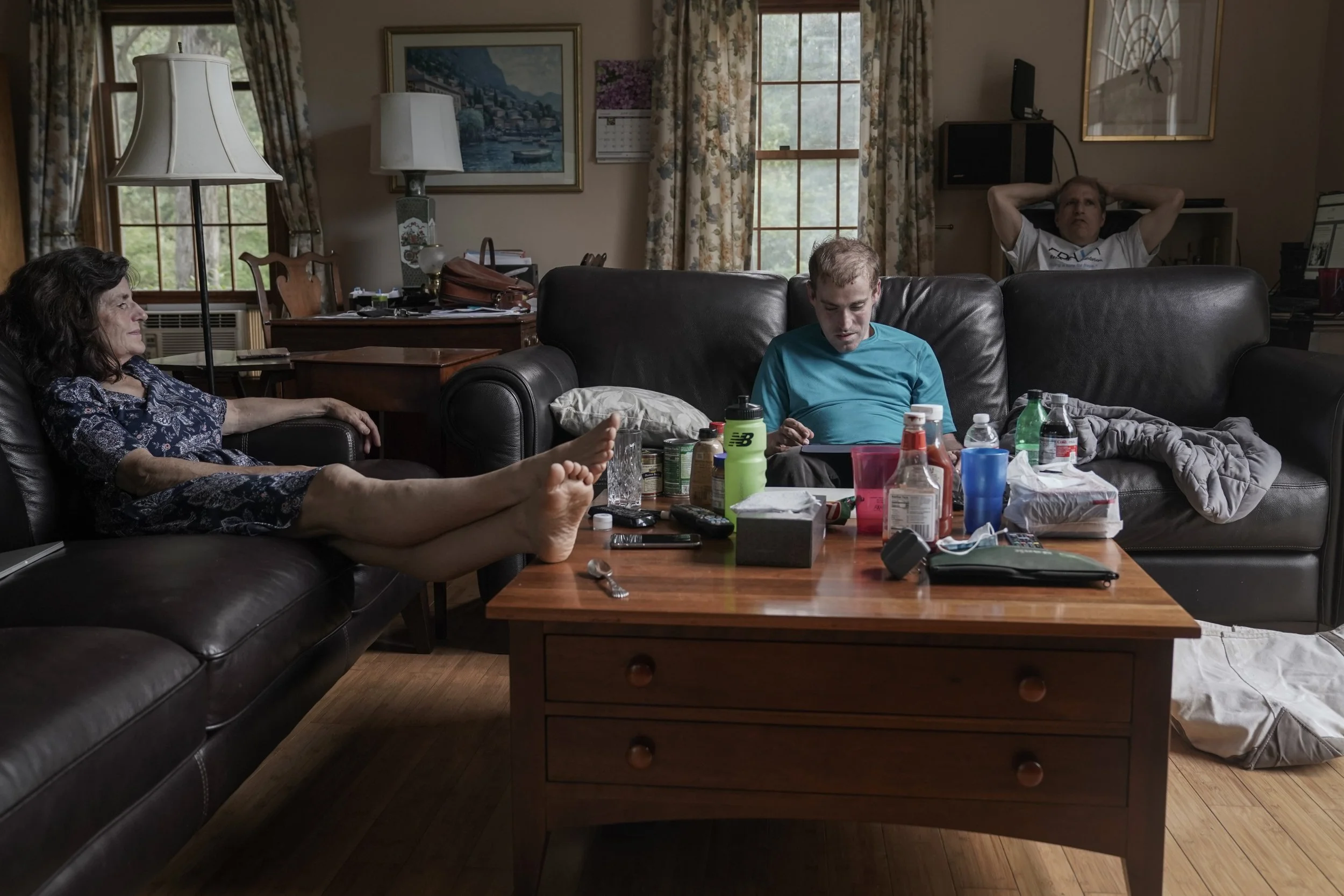  Katie Clapp, left, and her husband, Mike Tranfaglia, background, have worked for decades to find the best way to treat their son Andy's condition. 