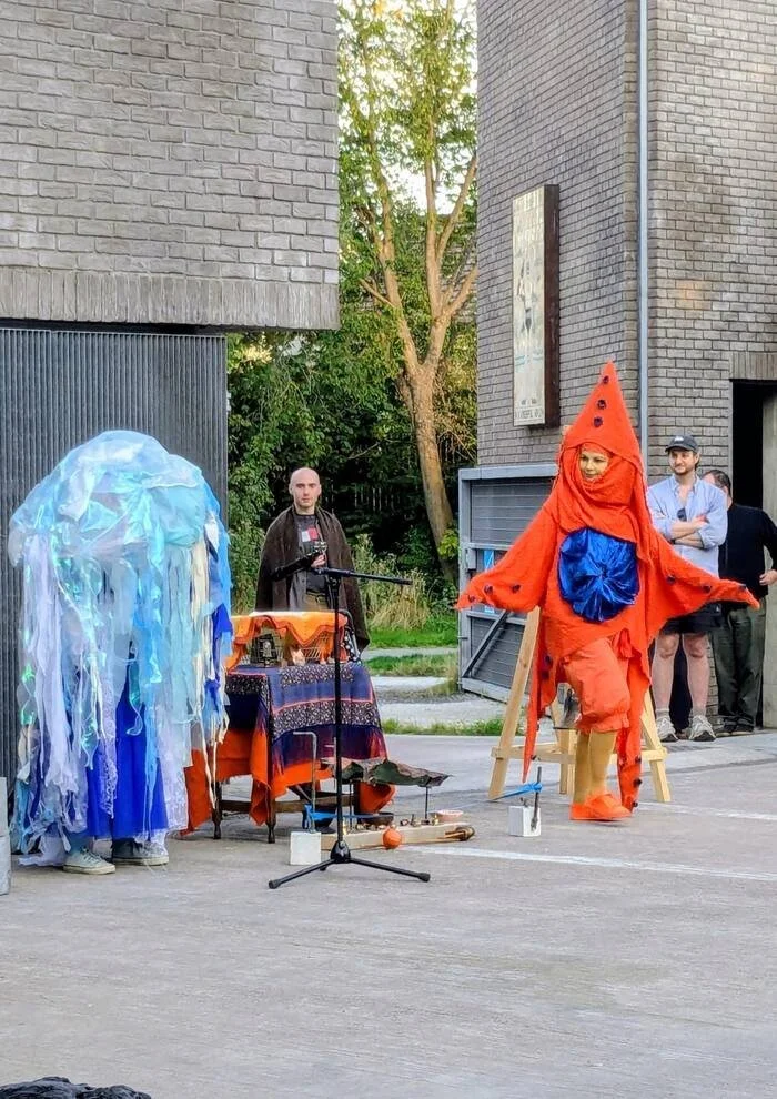Jill Martin Boualaxai and Fiona Oliver-Larkin perform as jellyfish and starfish figures during Sea Fallen Stars at Edinburgh Sculpture Workshop.