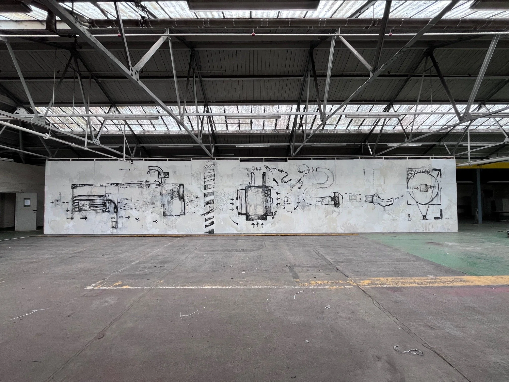 Fifteen-metre wall drawing mapping the footprints, movements and gestures associated with three decommissioned machines at The Paper Factory.