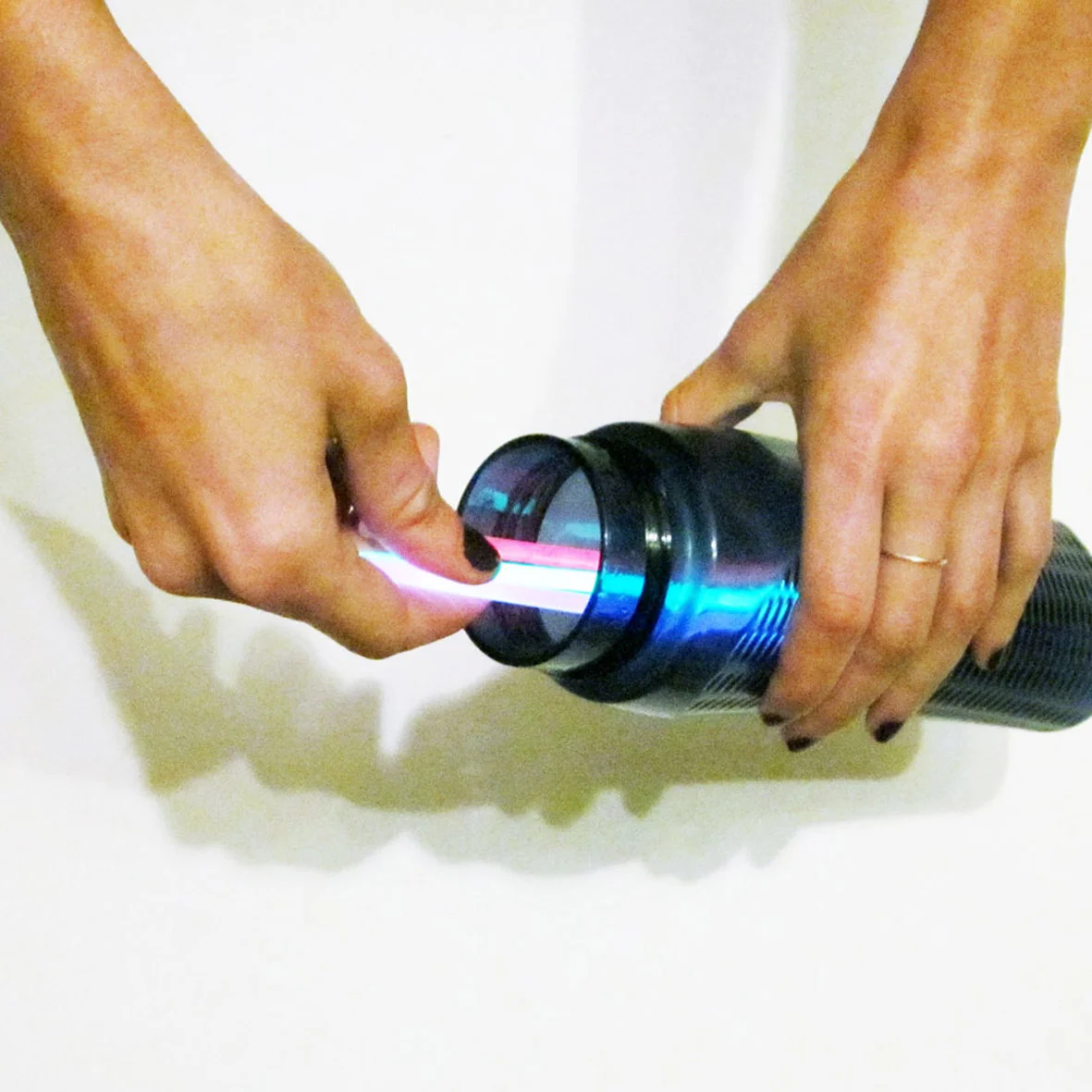 Put all the glow sticks in the bottle.