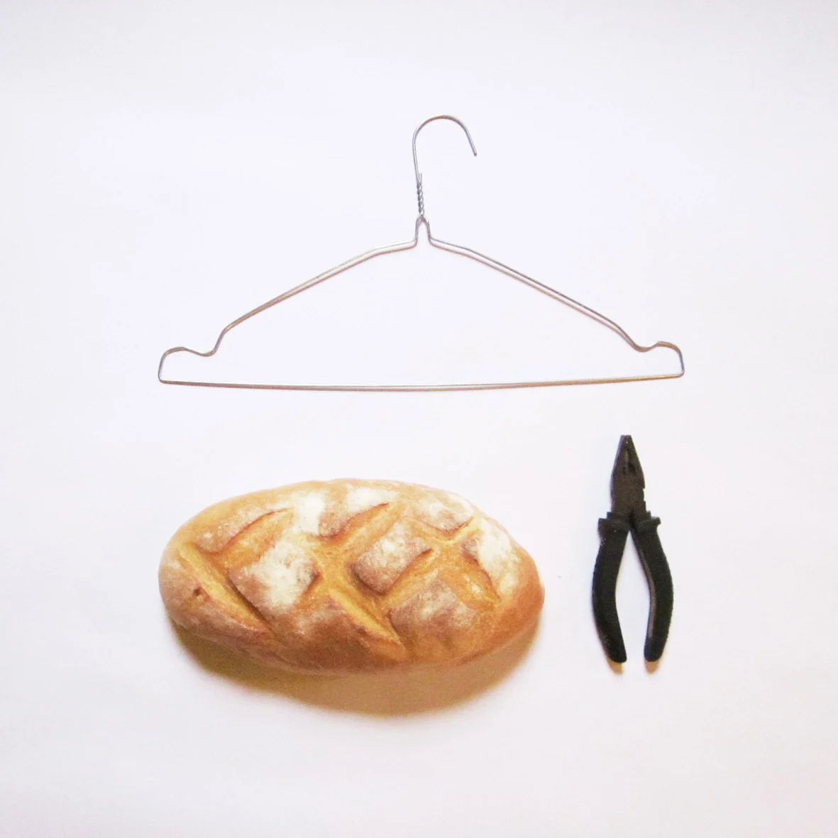 You'll need 1 x coat hanger and 1 x pair of pliers