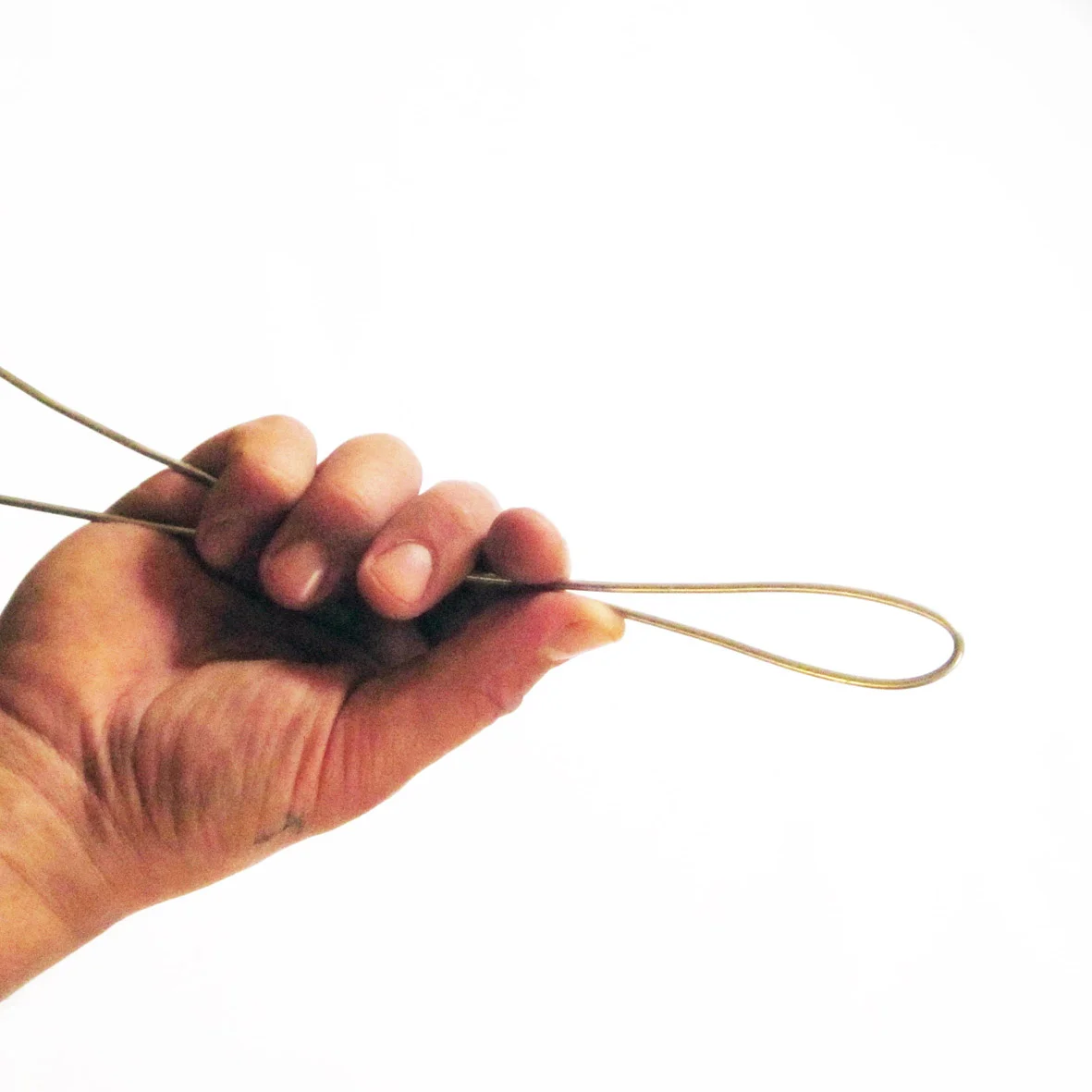 Fold the length of coat hanger in half