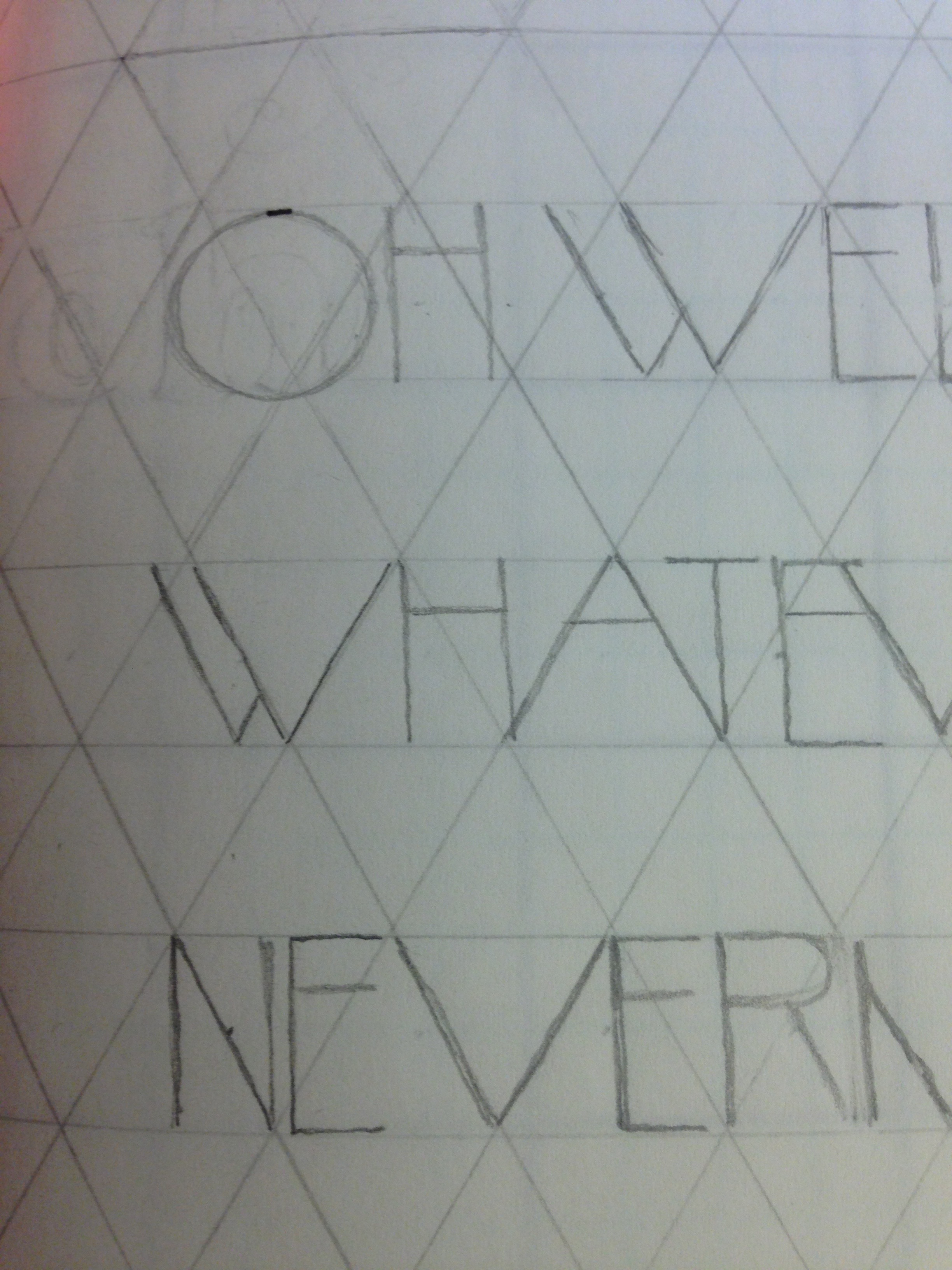 so I sketch out the letters and love how the "A" and "V" fall perfectly into the equilateral triangles. Happy accidents. Oh - and if you're wondering how to make a triangular grid like this, use a 60° angle, lines equidistant apart.