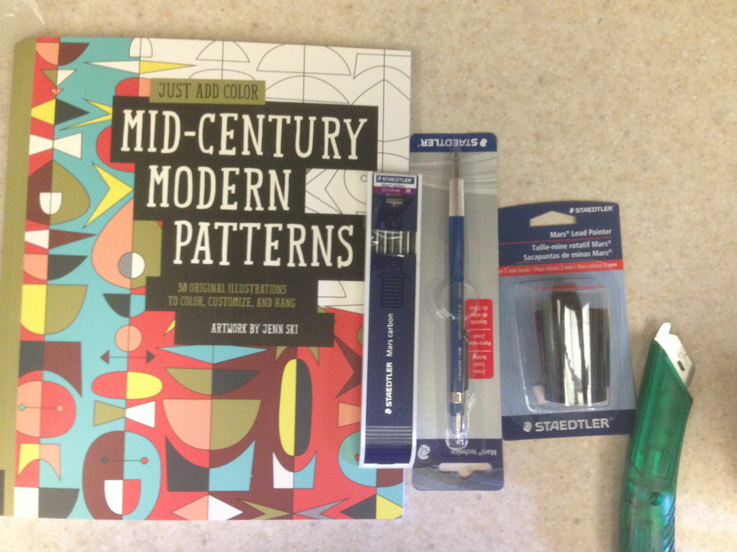  a fun coloring book, and a Staedler lead holder and sharpener for some serious drawing. 