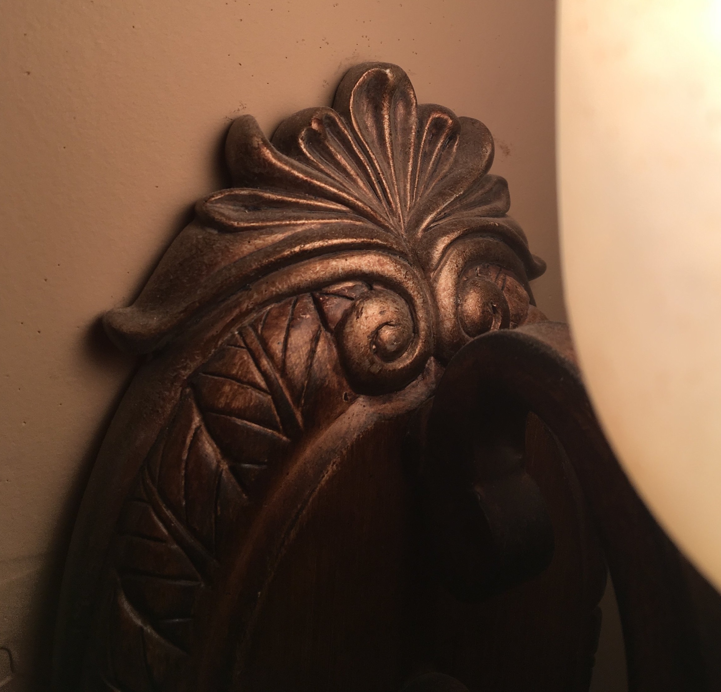 detail of a wall sconce in a friend’s bathroom.