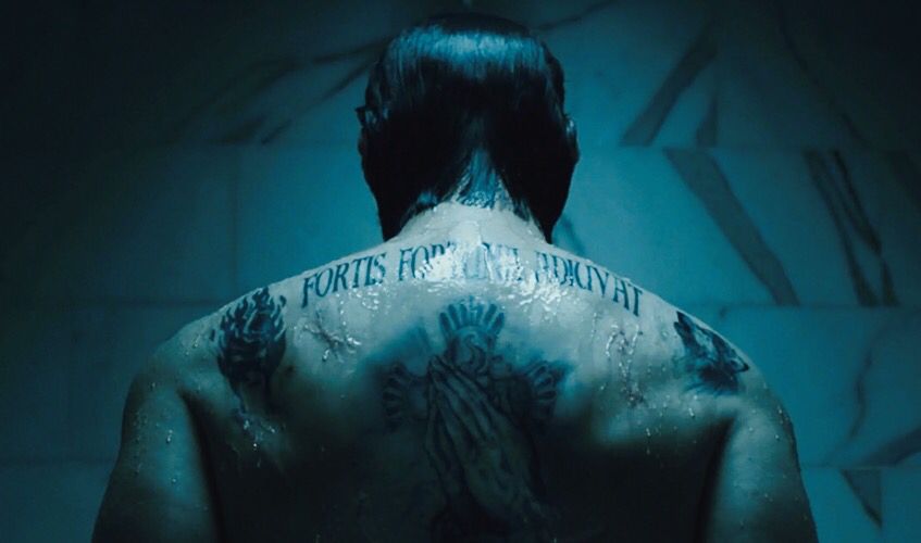  The lettering of   John Wick   (Keanu Reeves’s) tattoo, "Fortis Fortuna Adiuvat," or "fortune favors the brave" in Latin.  