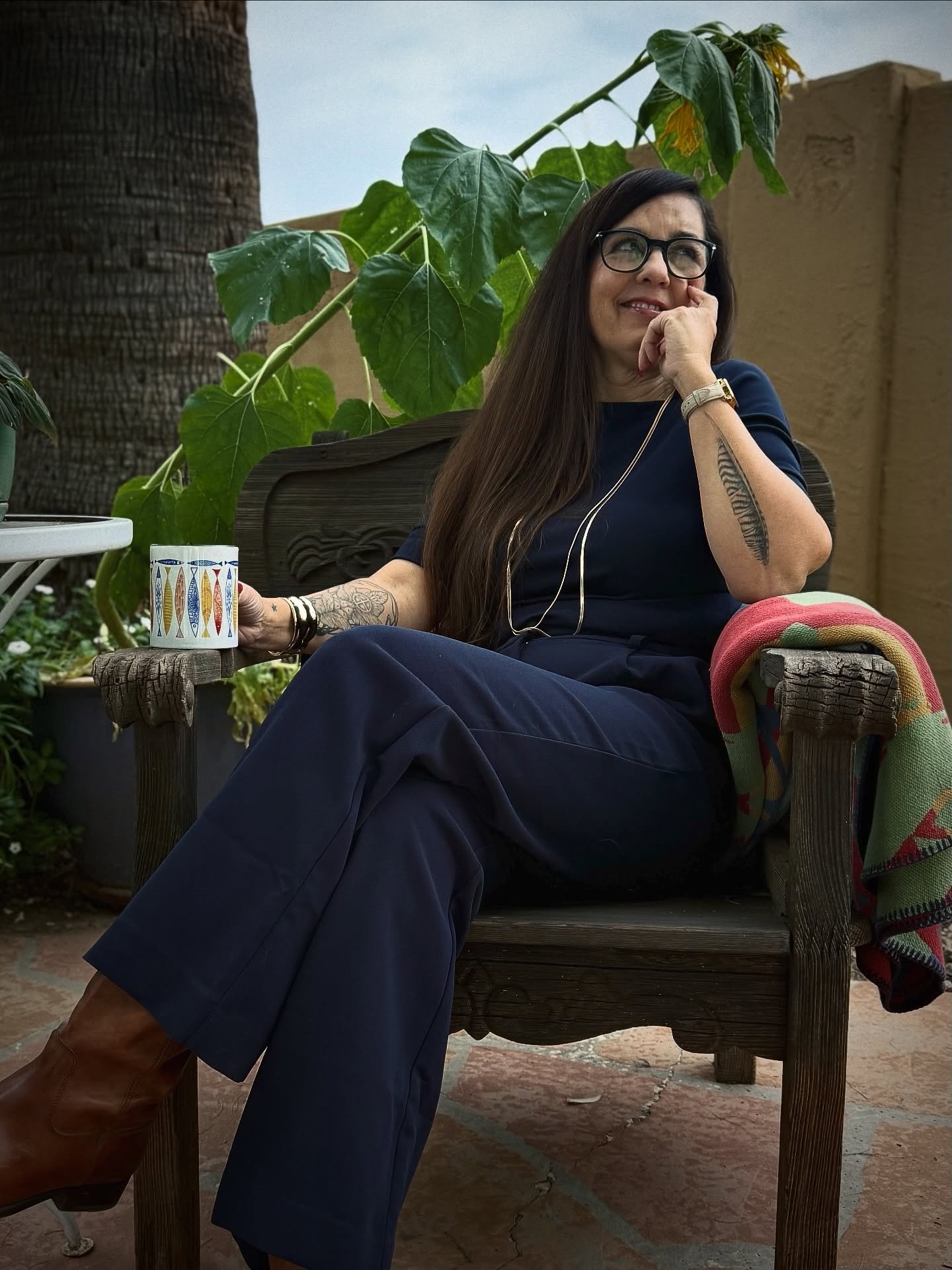I wanted to have my picture taken in these chairs, because they were a gift from my mother-in-law.
She recently moved out of state to live closer to my sister-in-law and her family, but she was one more person that I had to say goodbye to you this ye