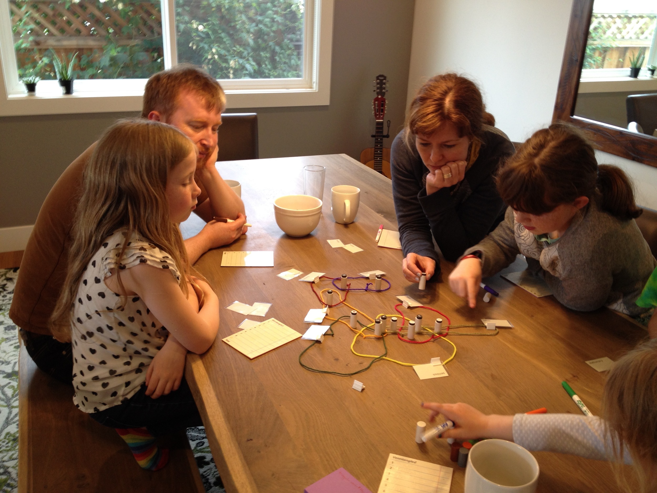Playtesting with the Rory O'Connor, Anita Murphy, and their family. Theses people are brilliant; if you haven't seen their Story Cubes or Extraordinaires Design Studio products, be sure to check them out.