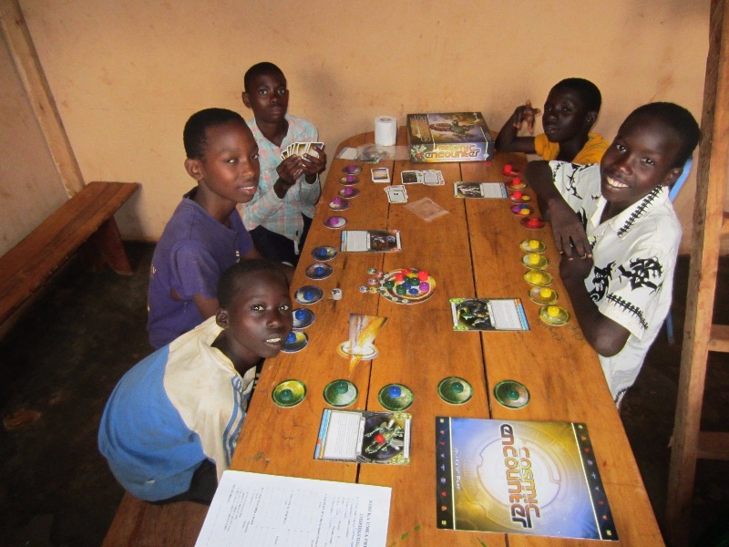 Codenames Pictures and Cosmic Encounter at the Ugandan Boardgame Convention