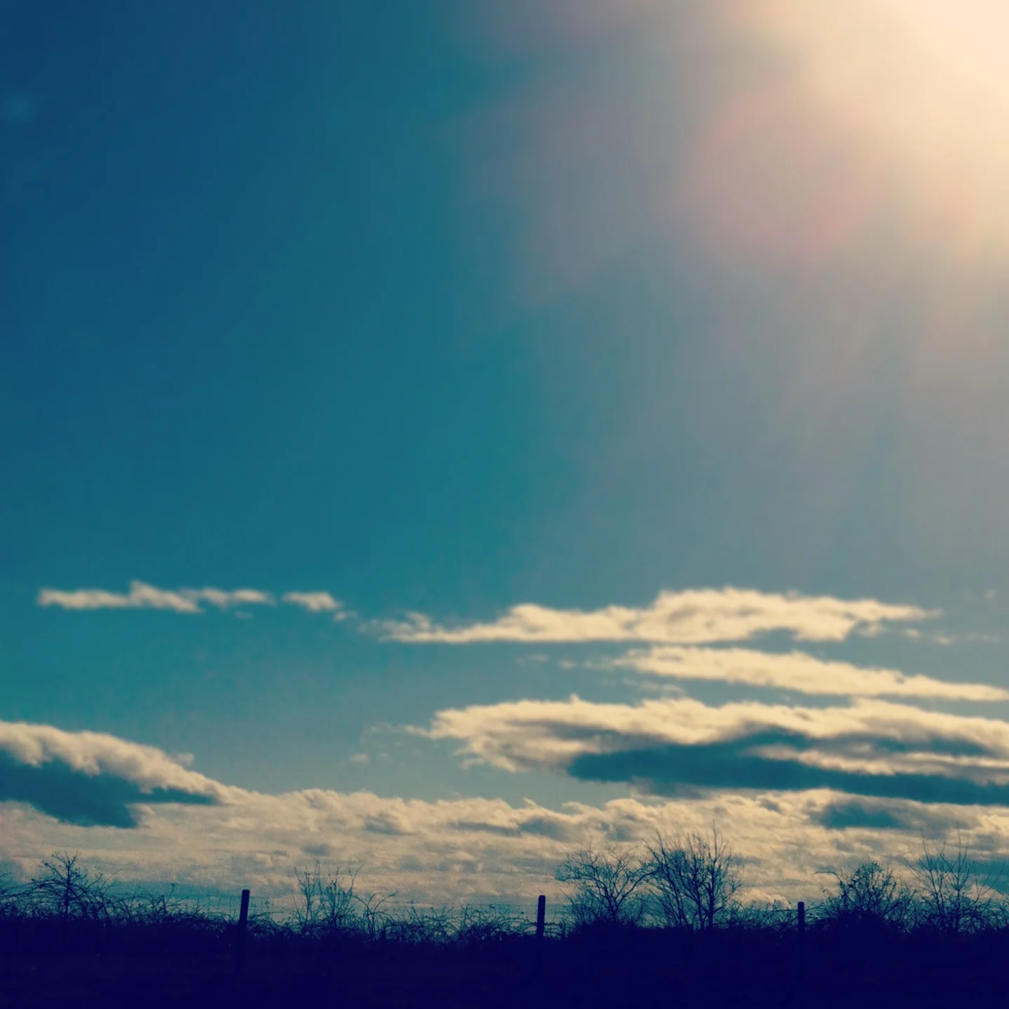 low horizon clouds over farm, washington, usa