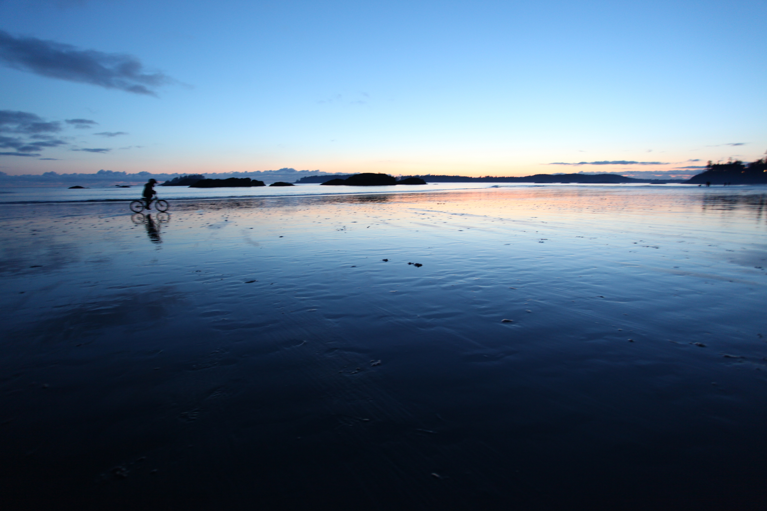 boy on bicycle, tofino, vancouver island, british columbia, canada