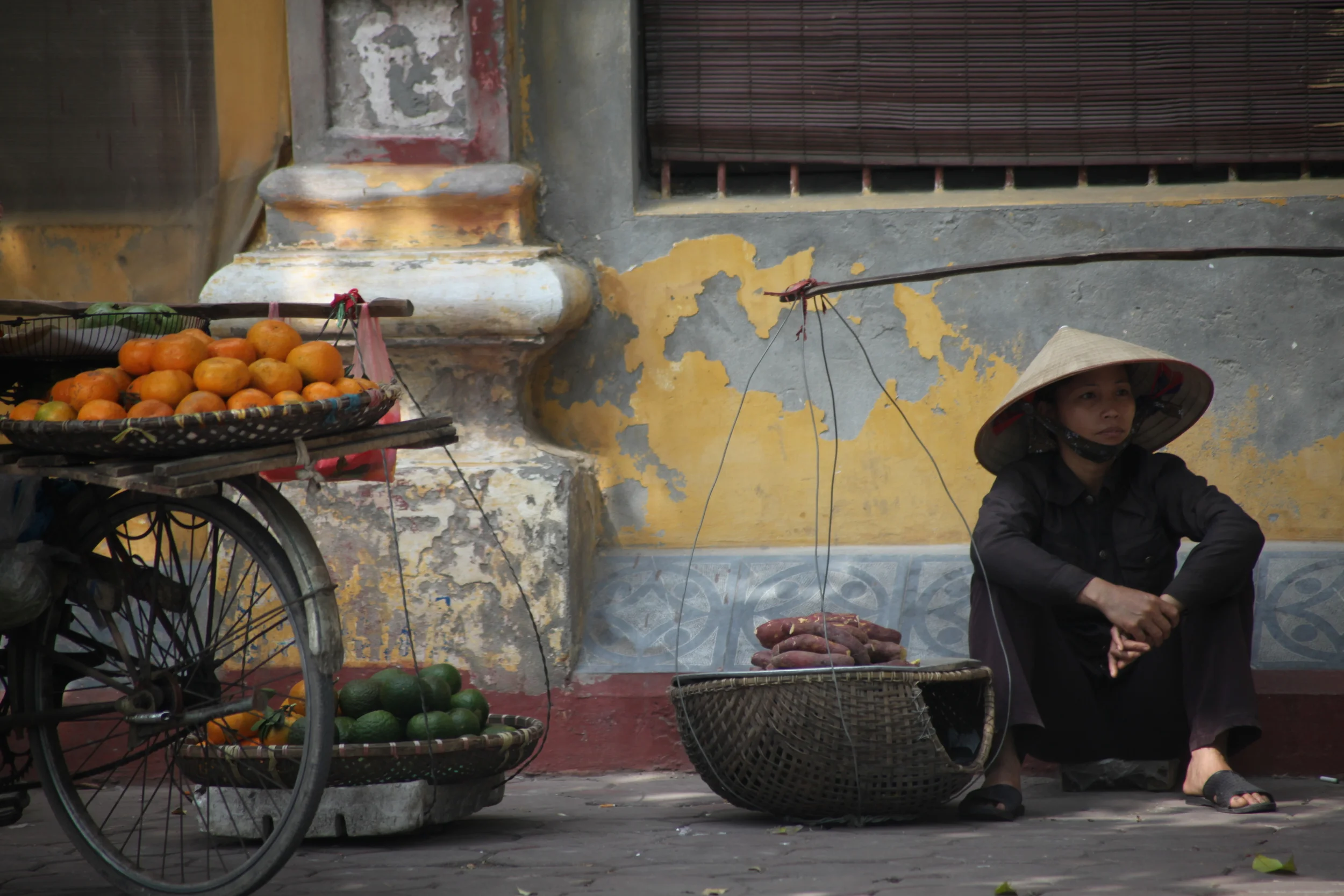 vendor selling vegetables, hanoi, vietnam