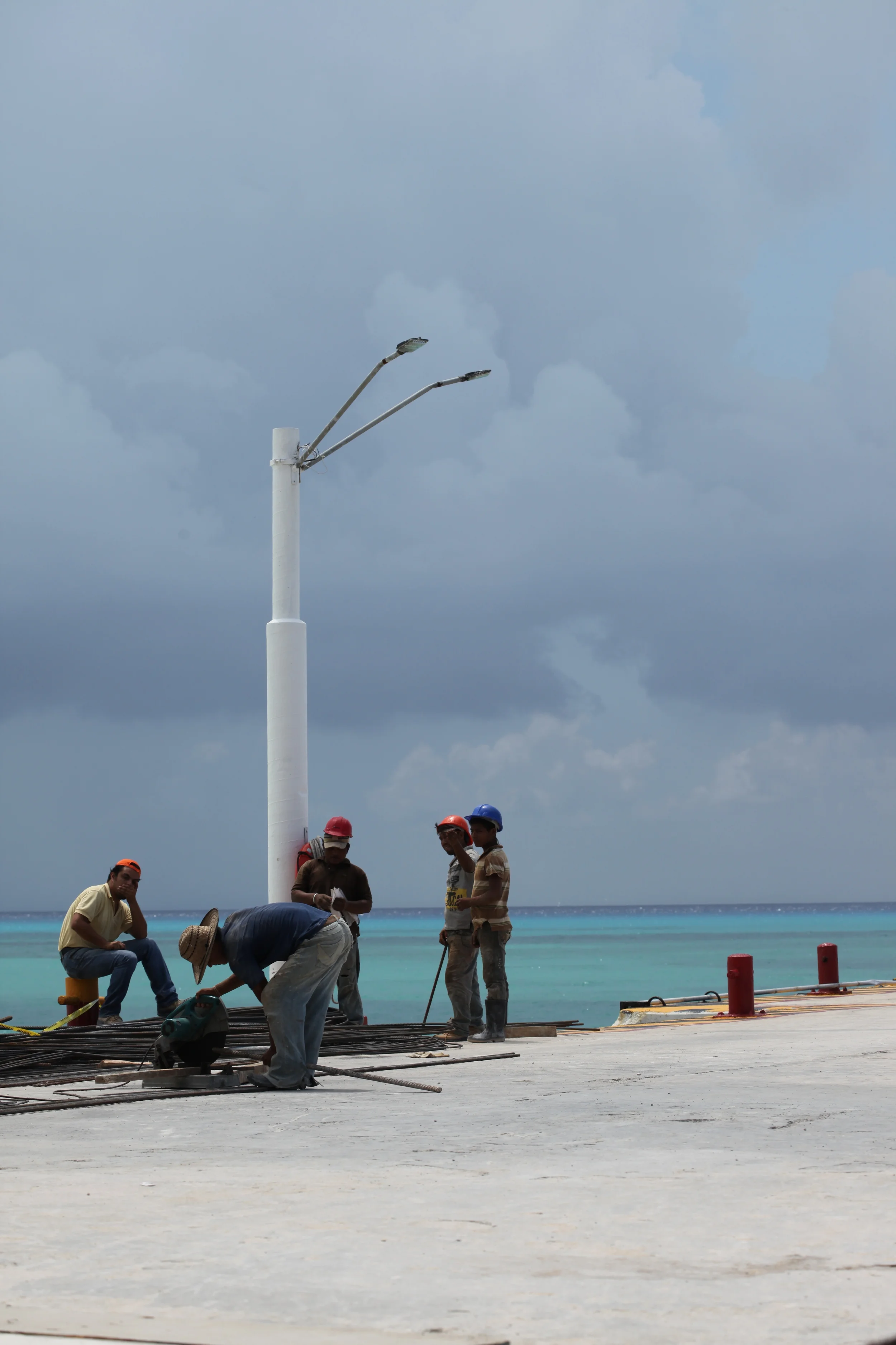 men working, cozumel, mexico