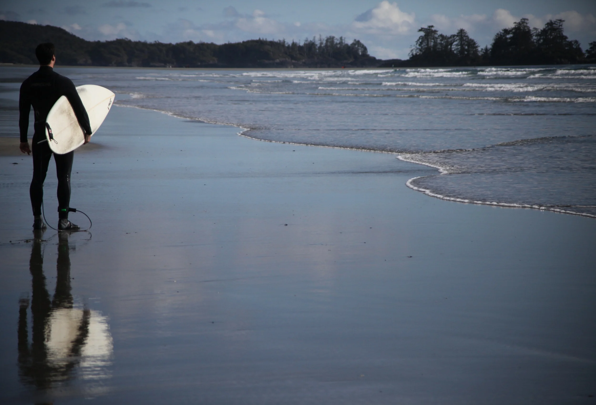 tofino surfer, vancouver island, british columbia, canada