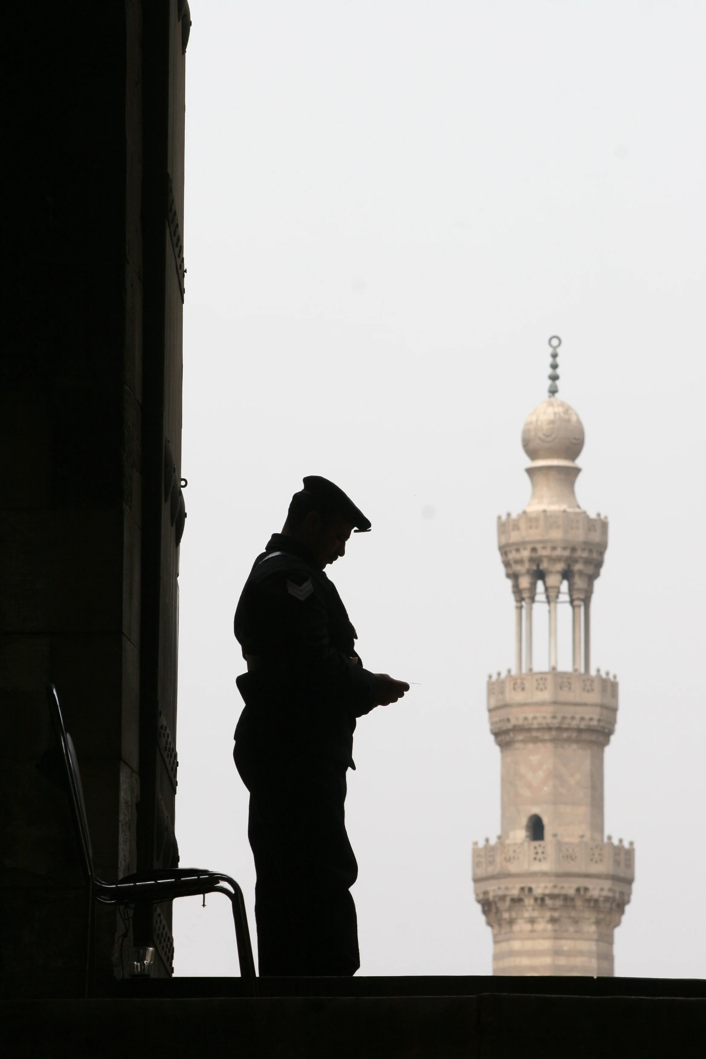 mosque guard, cairo, egypt