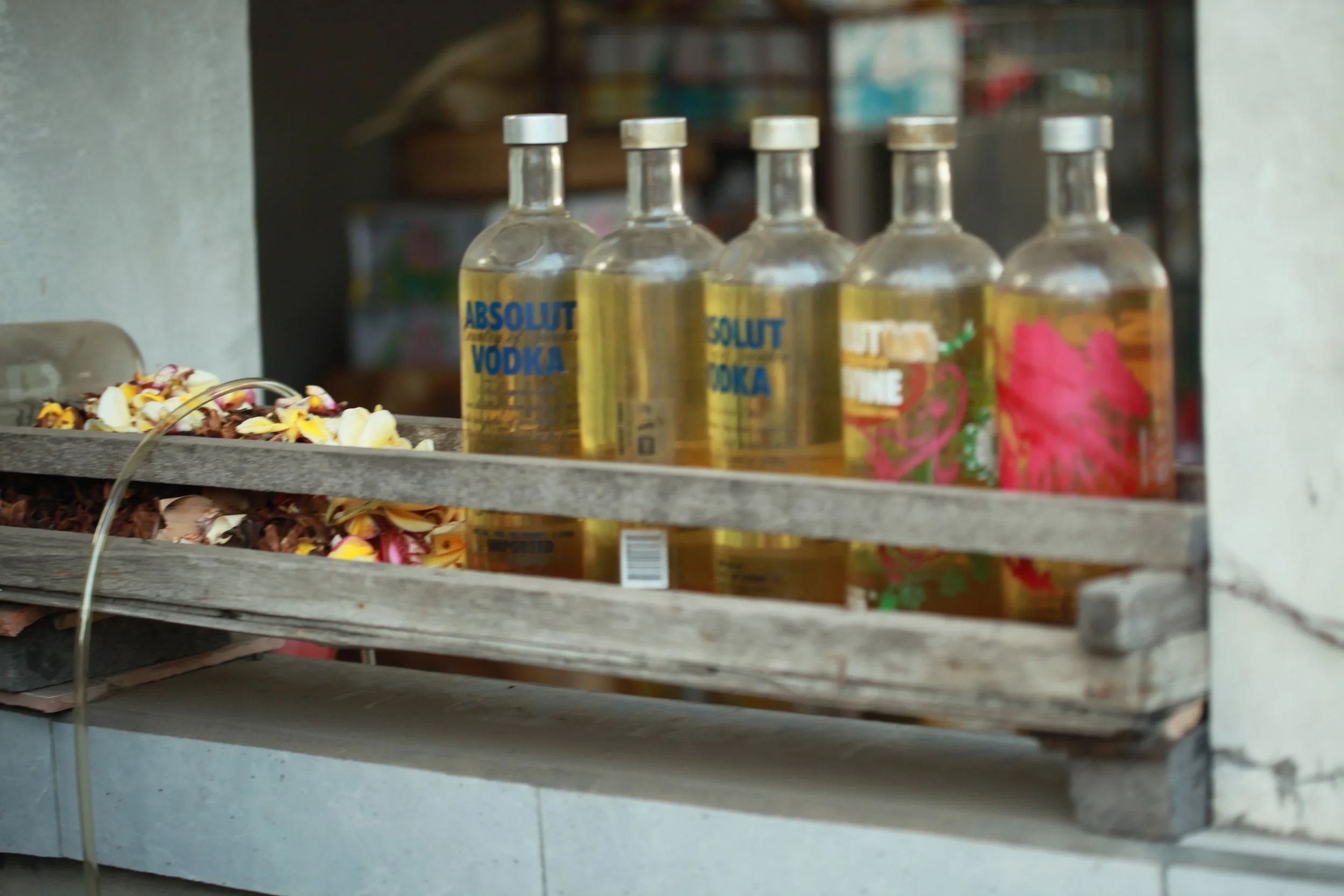 roadside petrol in absolut bottles, bali, indonesia