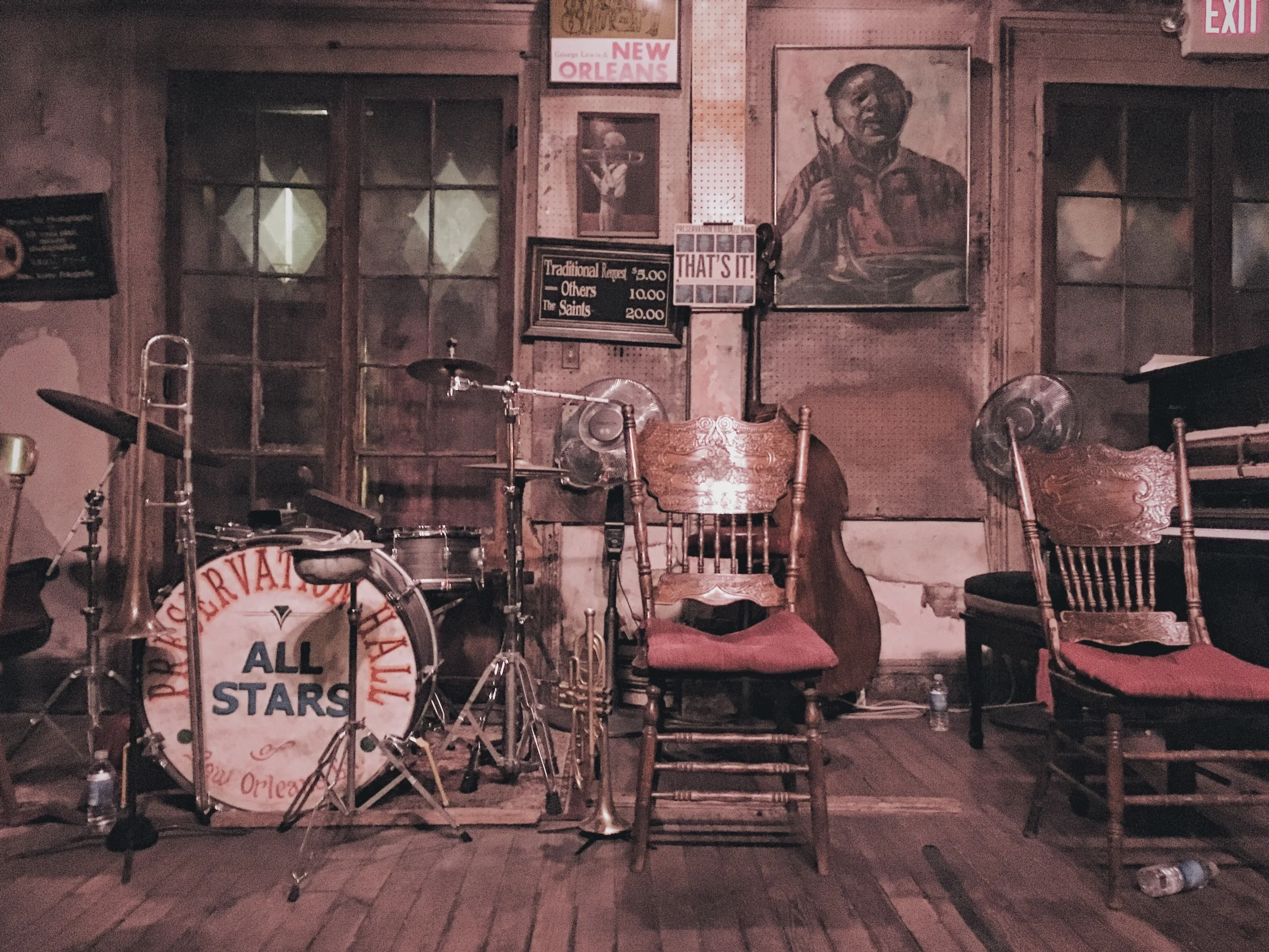 The Preservation Hall was established in 1961 to "preserve, perpetuate, and protect traditional New Orleans Jazz". The house band performs three, ~40 minute-long shows every night. One of the songs that the band played that night was "Do You Know What It Means To Miss New Orleans" by Louis Armstrong.