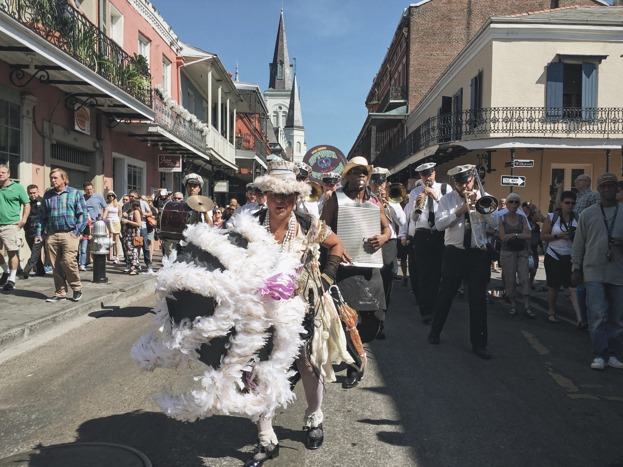 We were there to witness a Jazz Funeral of the famous celebrity chef Paul Prudhomme. The purpose of the jazz funeral is to "celebrates life at the moment of death". The brass band plays solemn music on the way to the grave and happy music on the return with participants dancing behind the band.