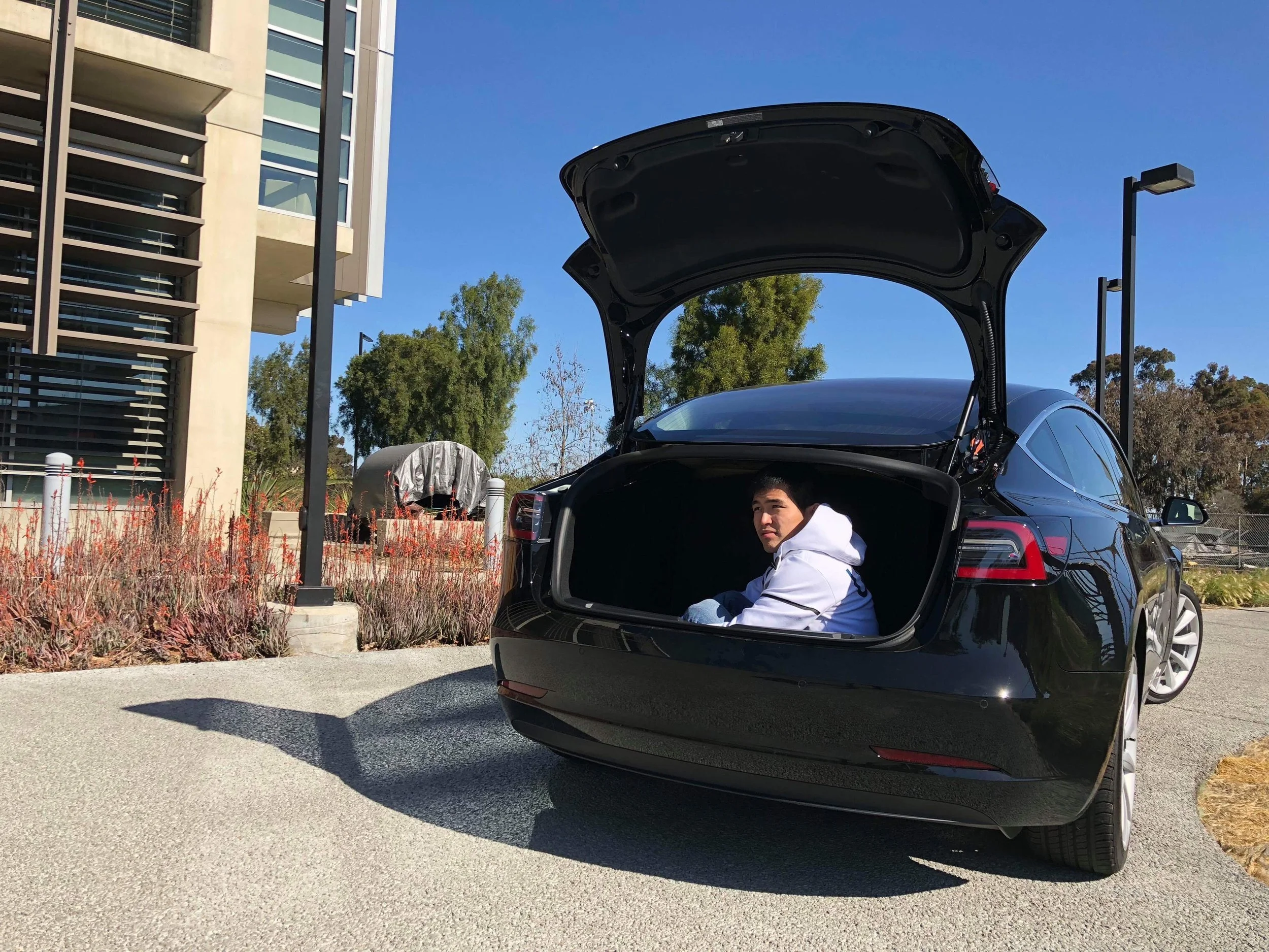 The trunk is pretty roomy. I can even fit sitting upright!