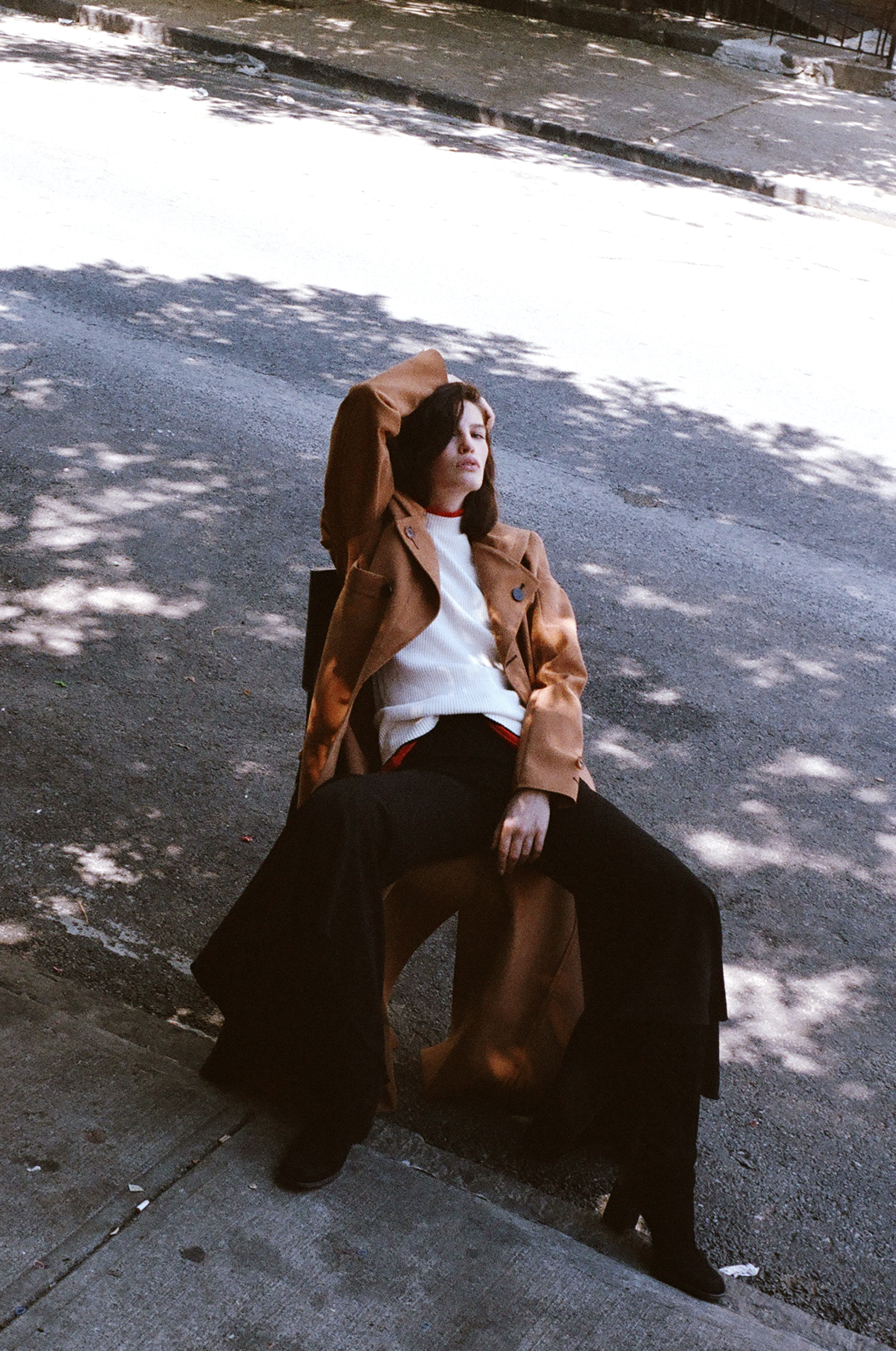 coat HOMIC , white top OPENING CEREMONY , red top (worn under) VINTAGE, trousers ELLERY , boots VINTAGE