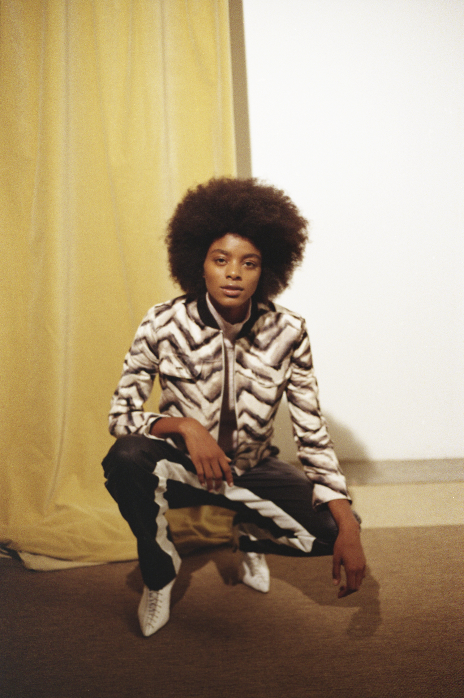 jacket LONGCHAMP, turtleneck DISTANTE, trousers MILA SCHON, shoes JOHN GALLIANO