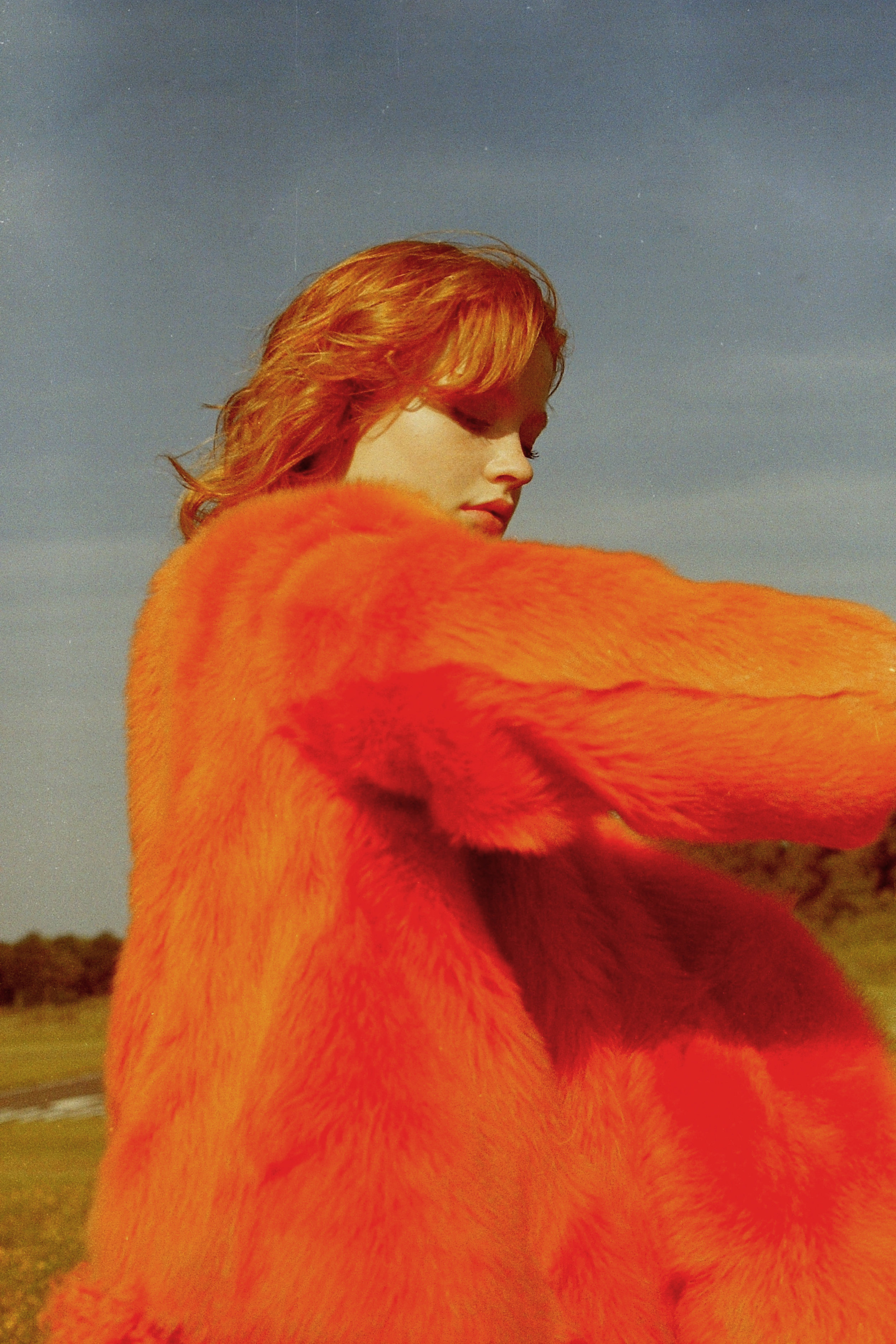 orange fur jacket PALOMA BARCELO , maroon dress SCHAI , shoes NICHOLAS K ear cuffs DAISY DION