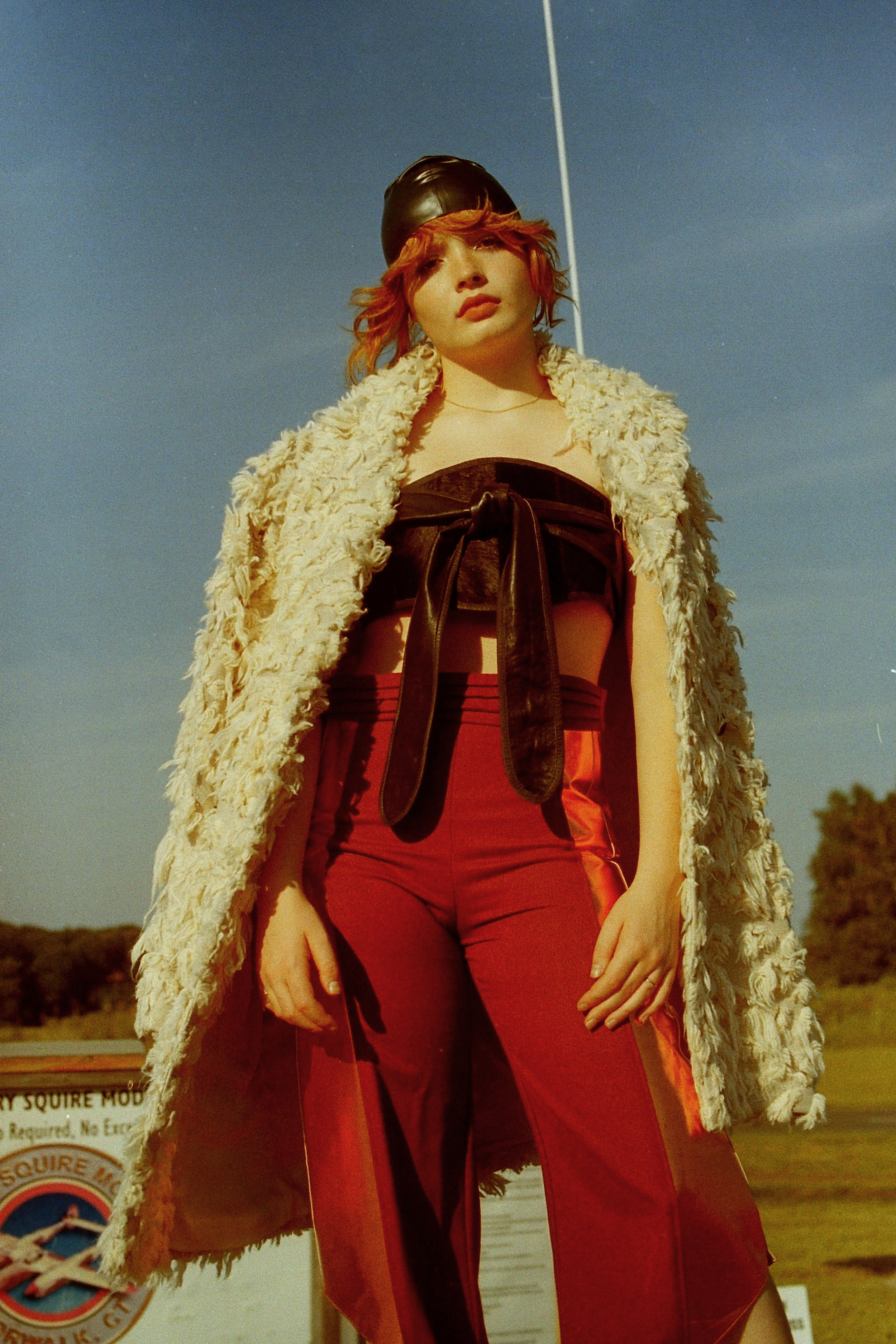 swim cap VINTAGE, jacket SCHAI , l eather + fur belt (worn as top) NICHOLAS K , trousers LINDY FOX , 