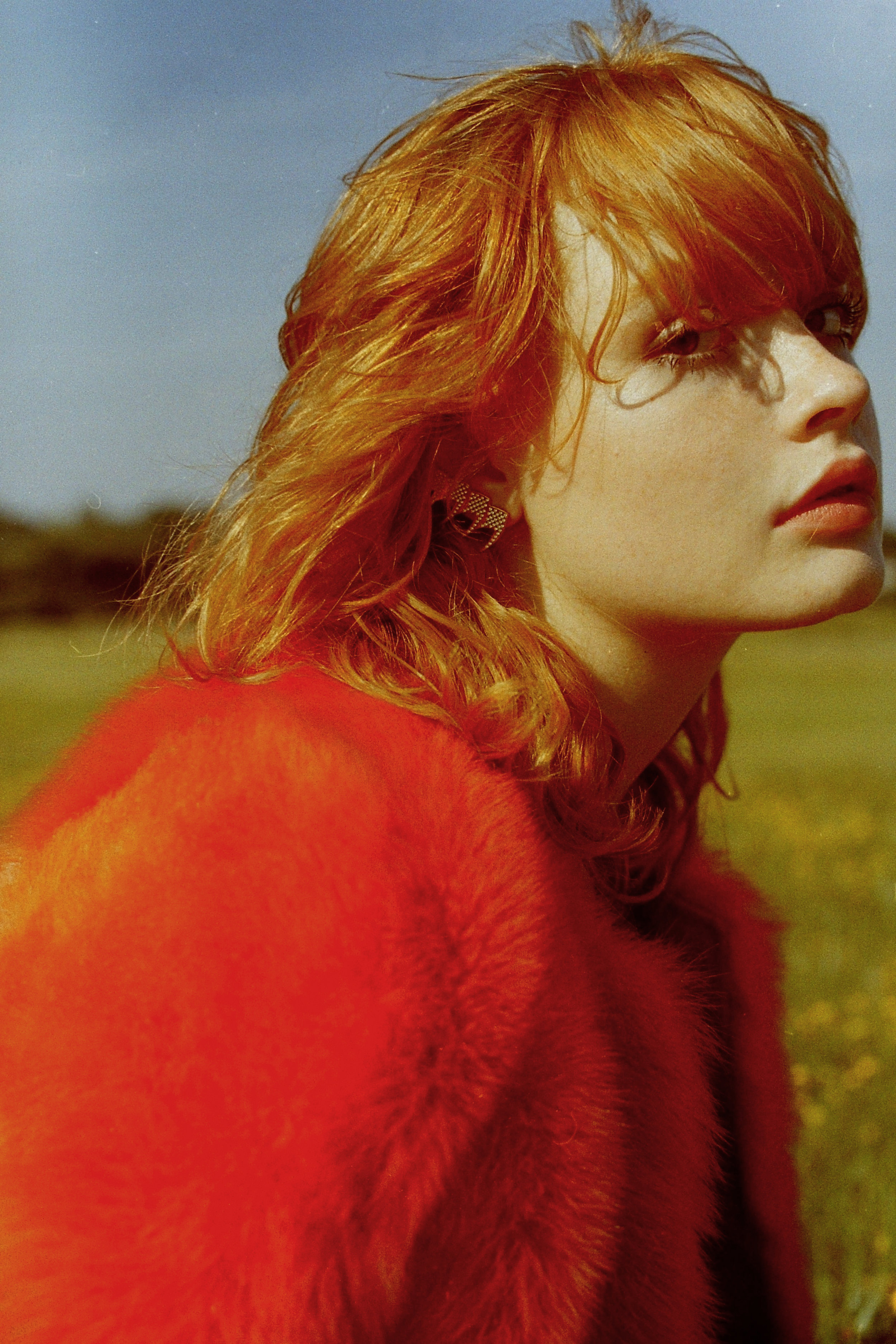 orange fur jacket PALOMA BARCELO , maroon dress SCHAI , shoes NICHOLAS K , ear cuffs DAISY DION