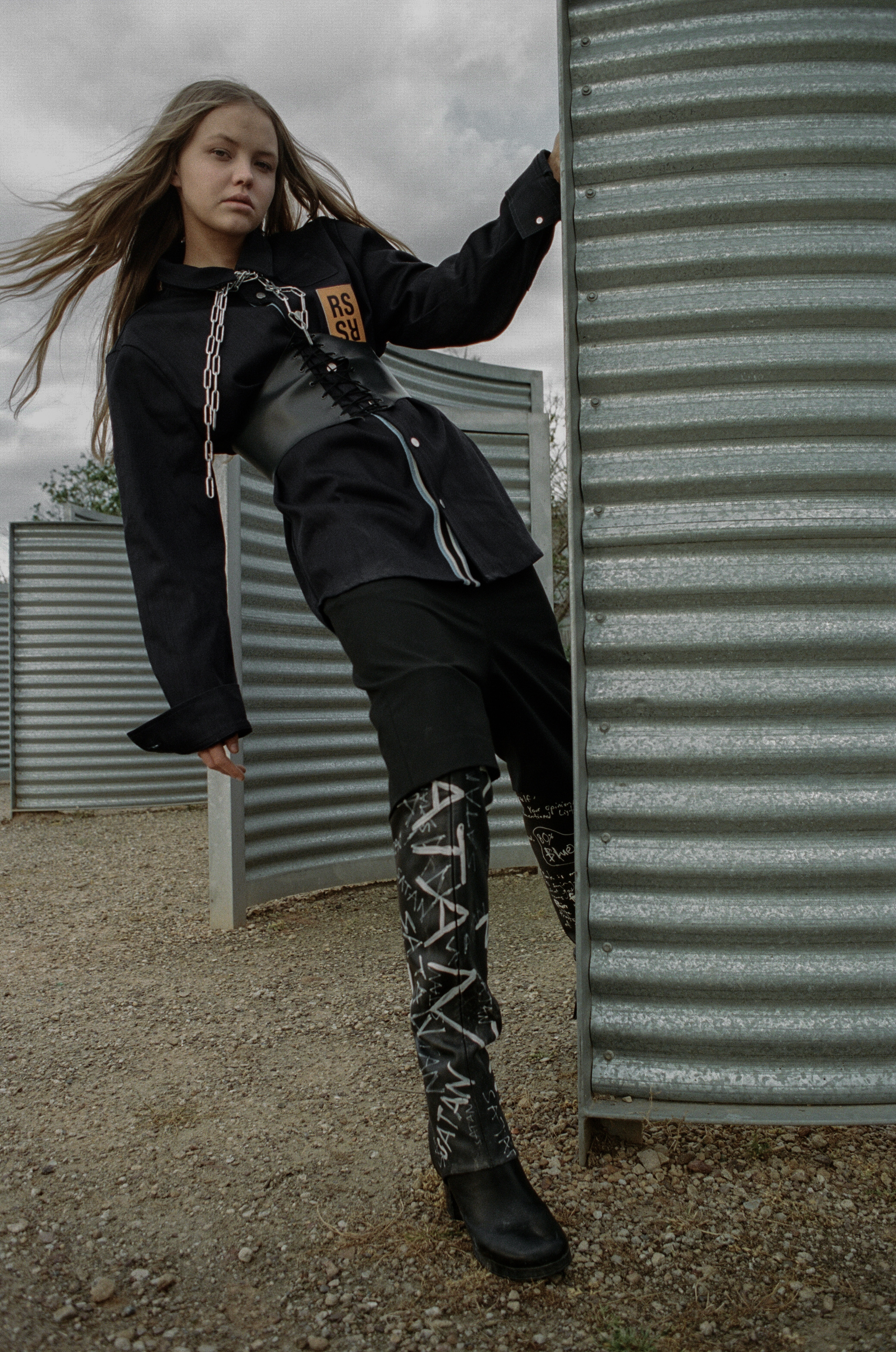 shirt RAF SIMONS , corset GABRIELLE GIBSON, shorts ELLERY, boots STOLEN GIRLFRIENDS CLUB , chain STYLIST'S OWN