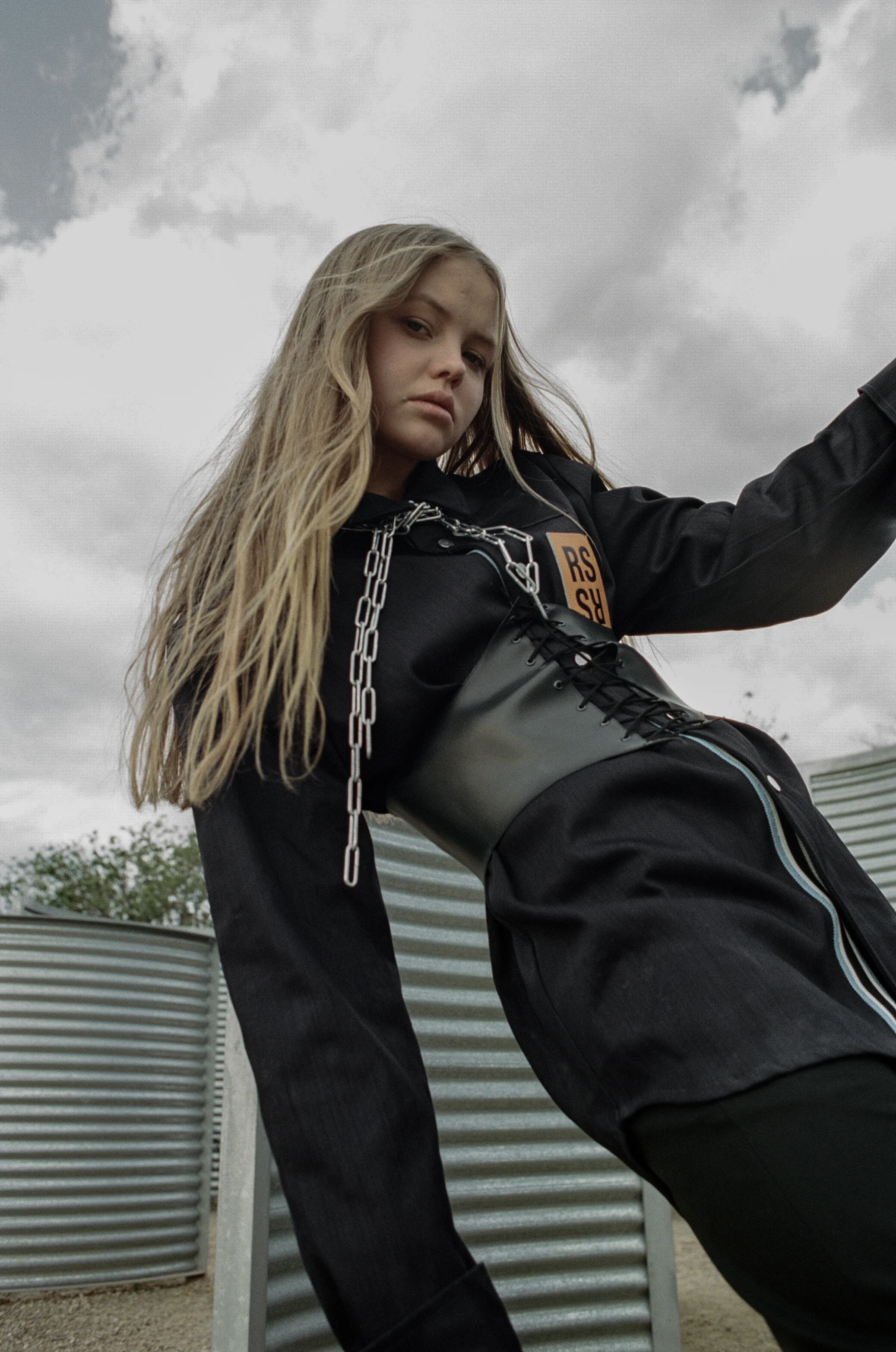 shirt RAF SIMONS , corset GABRIELLE GIBSON, shorts ELLERY, chain STYLIST'S OWN