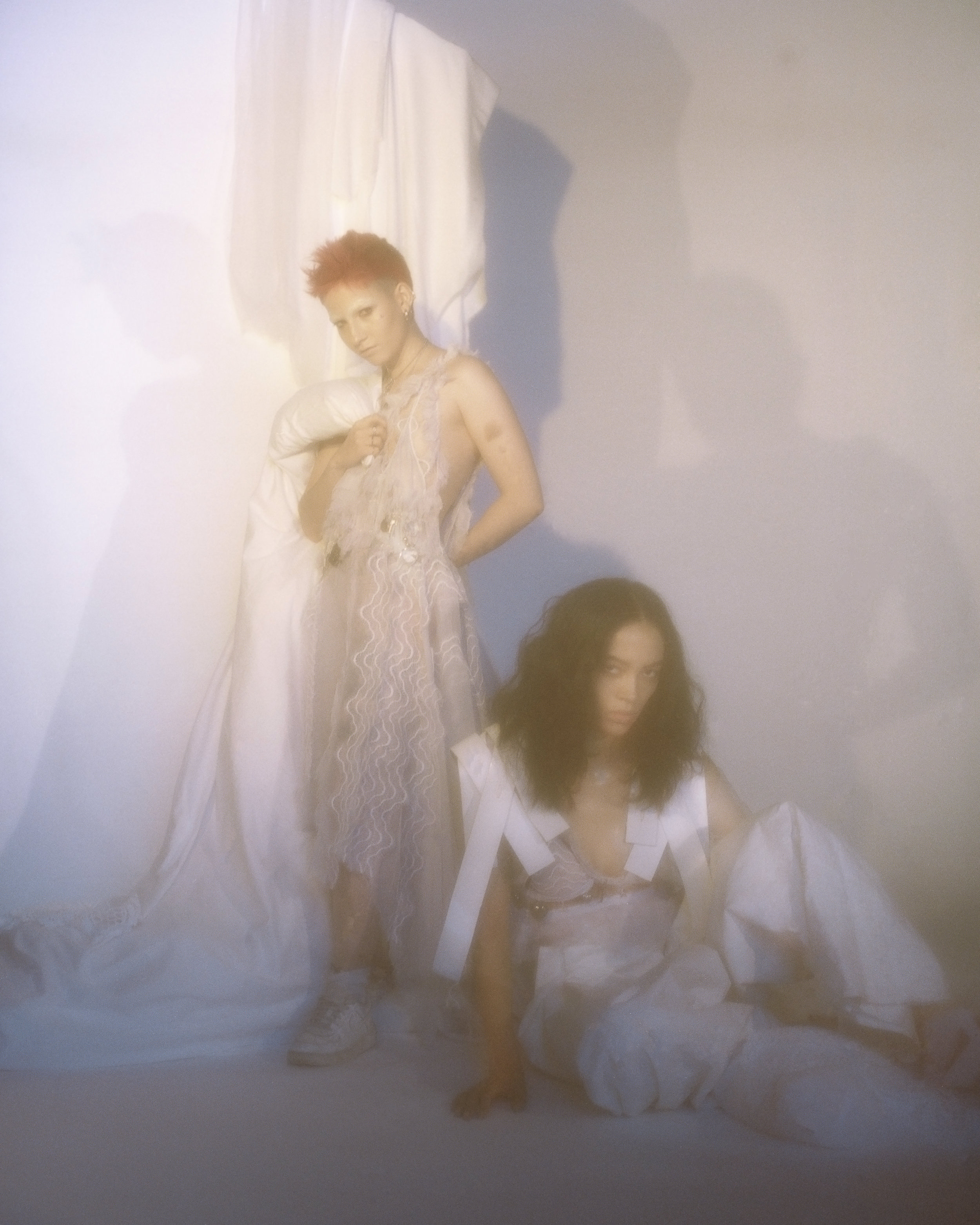 Emily wears jacket and trousers PERNILLA GREEK, bra DMITRY GOTSFRID Liz wears dress DMITRY GOTSFRID, shoes MODEL’S OWN